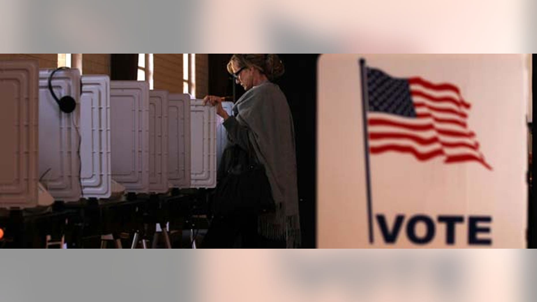 SANDY SPRINGS, GA - MARCH 06: Local resident Teri Rogers casts her vote at a polling station in St Andrew Presbyterian Church March 6, 2012 in Sandy Springs, Georgia. Ten states, including Georgia, hold caucuses and primaries today for voters to pick their choices for the Republican presidential nominee. (Photo by Alex Wong/Getty Images)