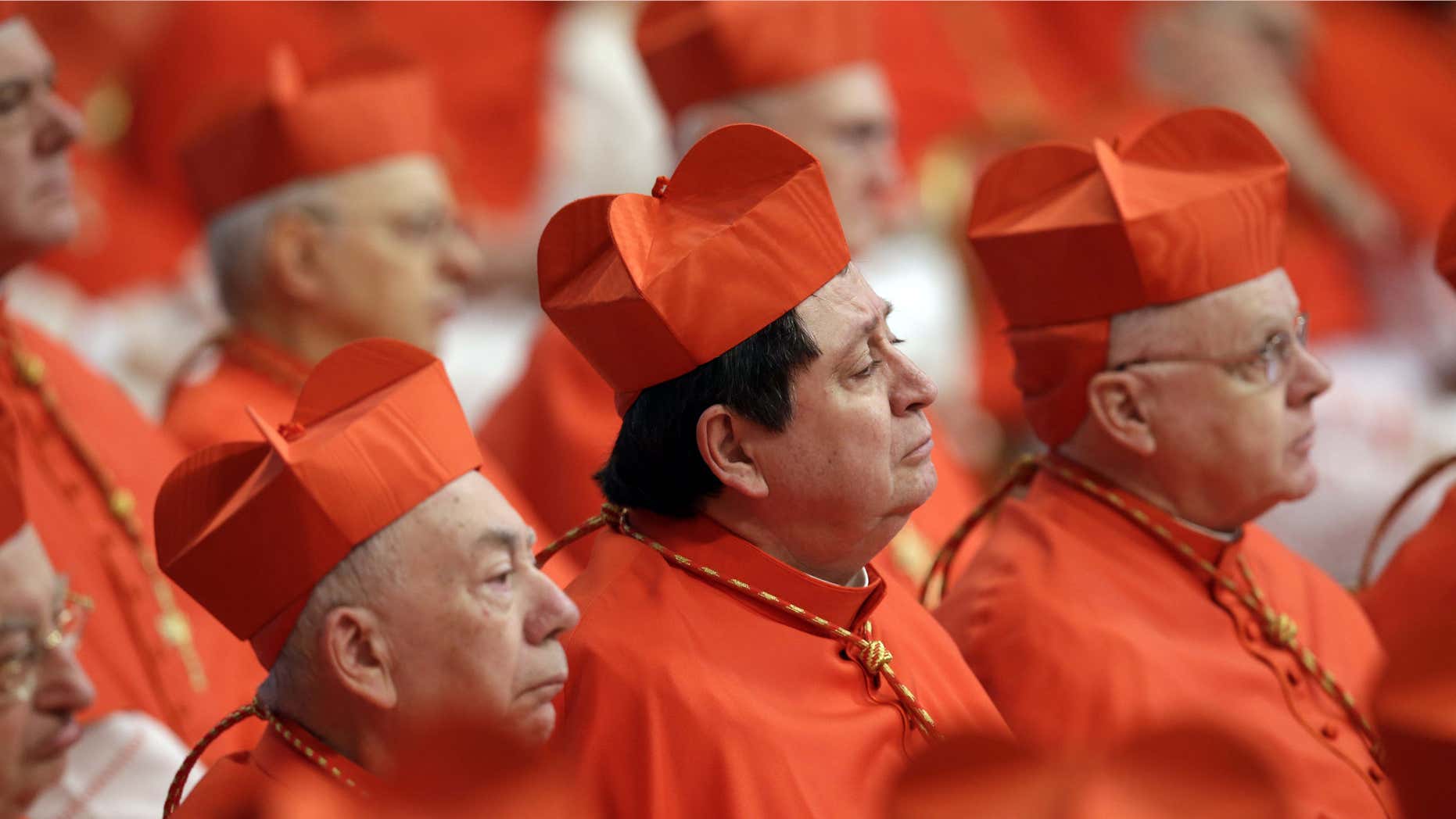 Feb. 14, 2015: Cardinals listens to Pope Francis celebrating a Mass in St. Peter's Basilica at the Vatican.