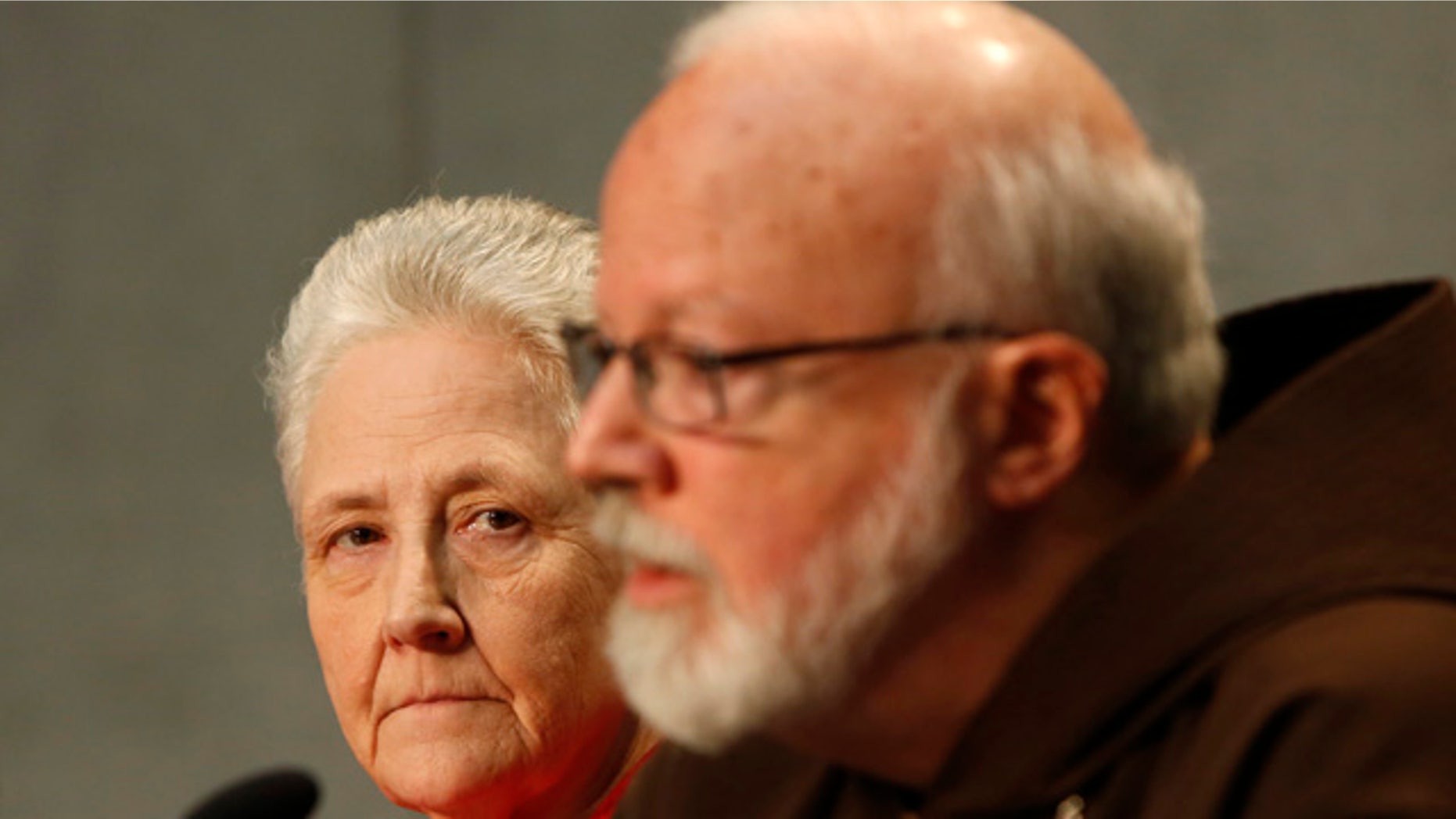 May 3, 2014: Cardinal Sean O'Malley, the archbishop of Boston, right, and Marie Collins attend a press conference at the Vatican. Members of Pope Francis' sexual abuse advisory board say they will develop specific protocols to hold bishops and other church authorities accountable if they fail to report suspected abuse or protect children from pedophile priests. (AP Photo/Riccardo De Luca)