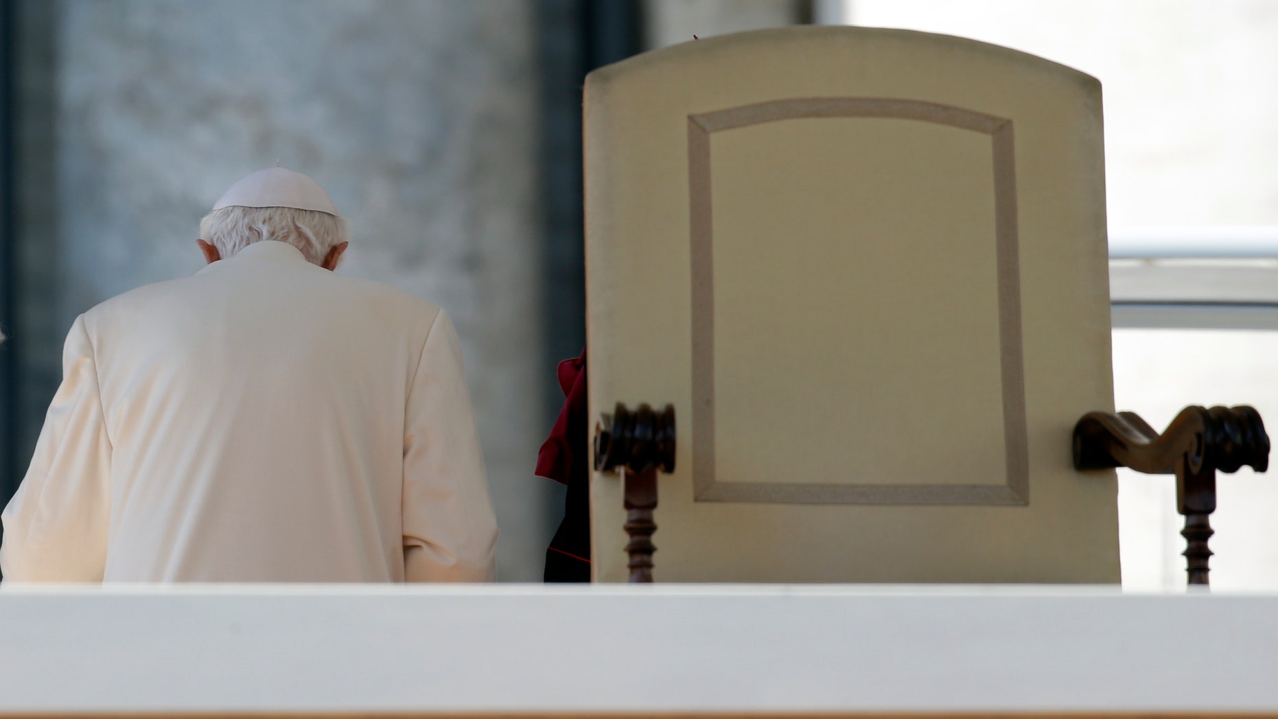 Feb. 27, 2013 FILE photo shows Pope Benedict XVI leaving after celebrating his last general audience, in St. Peter's Square, at the Vatican.