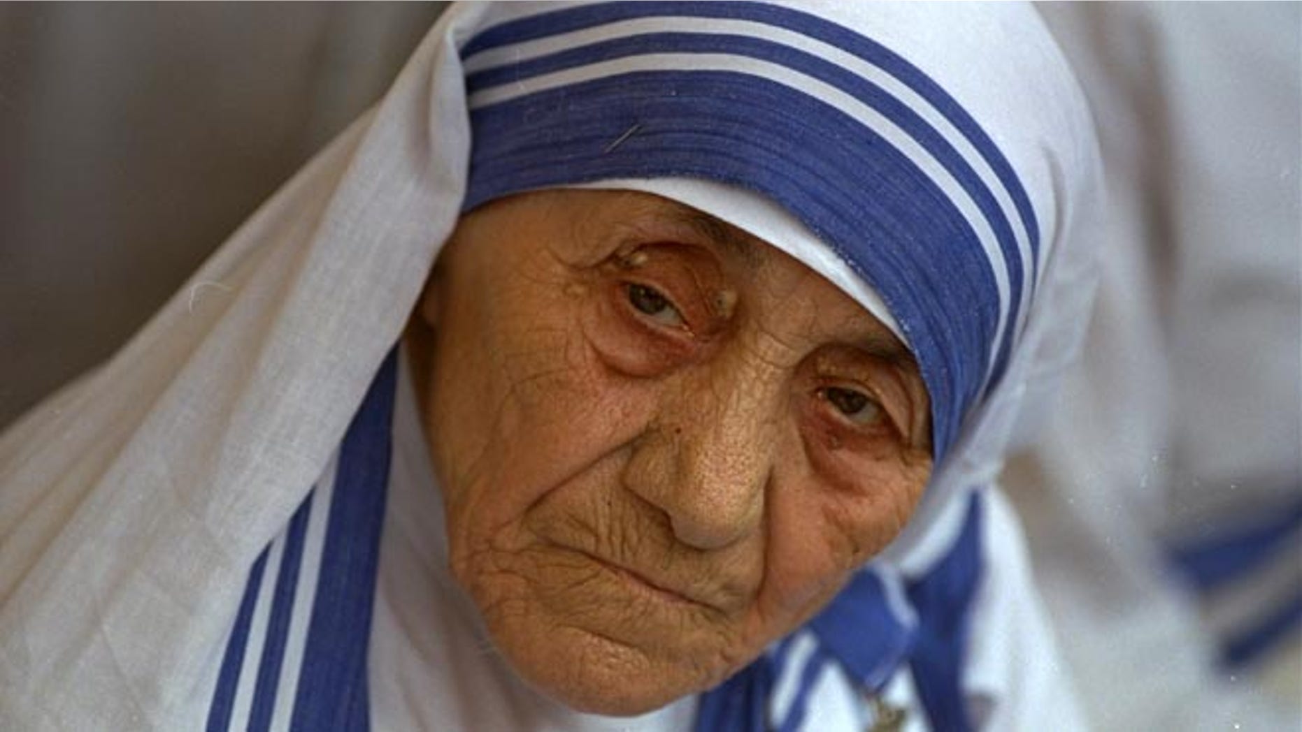 FILE - In this Aug. 25, 1993 file photo Mother Teresa, head of Missionaries of Charity, is photographed, in New Delhi, India. Pope Francis has signed off on the miracle needed to make Mother Teresa a saint, giving the nun who cared for the poorest of the poor one of the Catholic Church's highest honors just two decades after her death. The Vatican said Friday, Dec. 18, 2015, that Francis approved a decree attributing a miracle to Mother Teresa's intercession during an audience with the head of the Vatican's saint-making office on Thursday, his 79th birthday. (AP Photo, file)