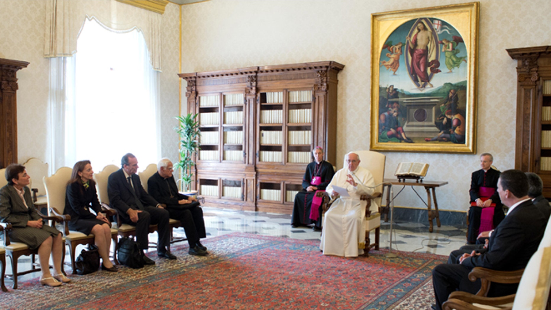 In this photo released by Vatican newspaper L'Osservatore Romano, Pope Francis meets members of the International Catholic Child Bureau, at the Vatican Friday, April 11, 2014. Pope Francis asked for forgiveness Friday from people who were sexually abused by priests, and vowed that there will be no going back in the church's fight to protect children. Francis made the off-the-cuff remarks after coming under criticism from victims' advocacy groups for a perceived lack of attention to the problem and ongoing demands that he sanction bishops who covered up for pedophiles. In his remarks to members of the International Catholic Child Bureau, a French Catholic network of organizations that protects children's rights, Francis said he felt "called to take it upon myself" and "ask forgiveness" for the evil that some priests had committed against children. "The church is aware of this damage," he was quoted as saying by Vatican Radio. (AP Photo/L'Osservatore Romano)