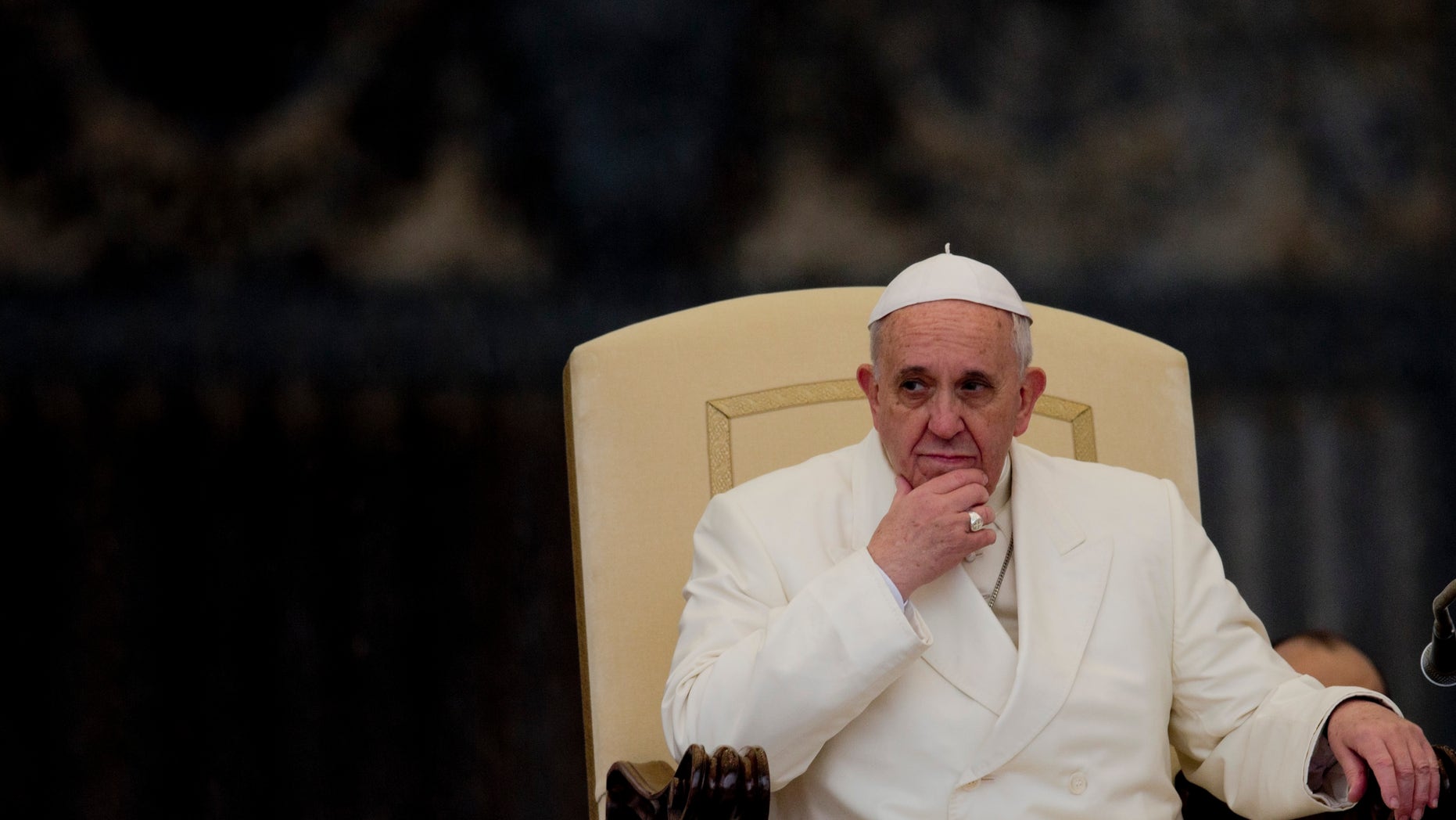 Feb. 5, 2014: Pope Francis listens to his speech being translated in several languages, during his weekly general audience in St. Peter's Square at the Vatican.