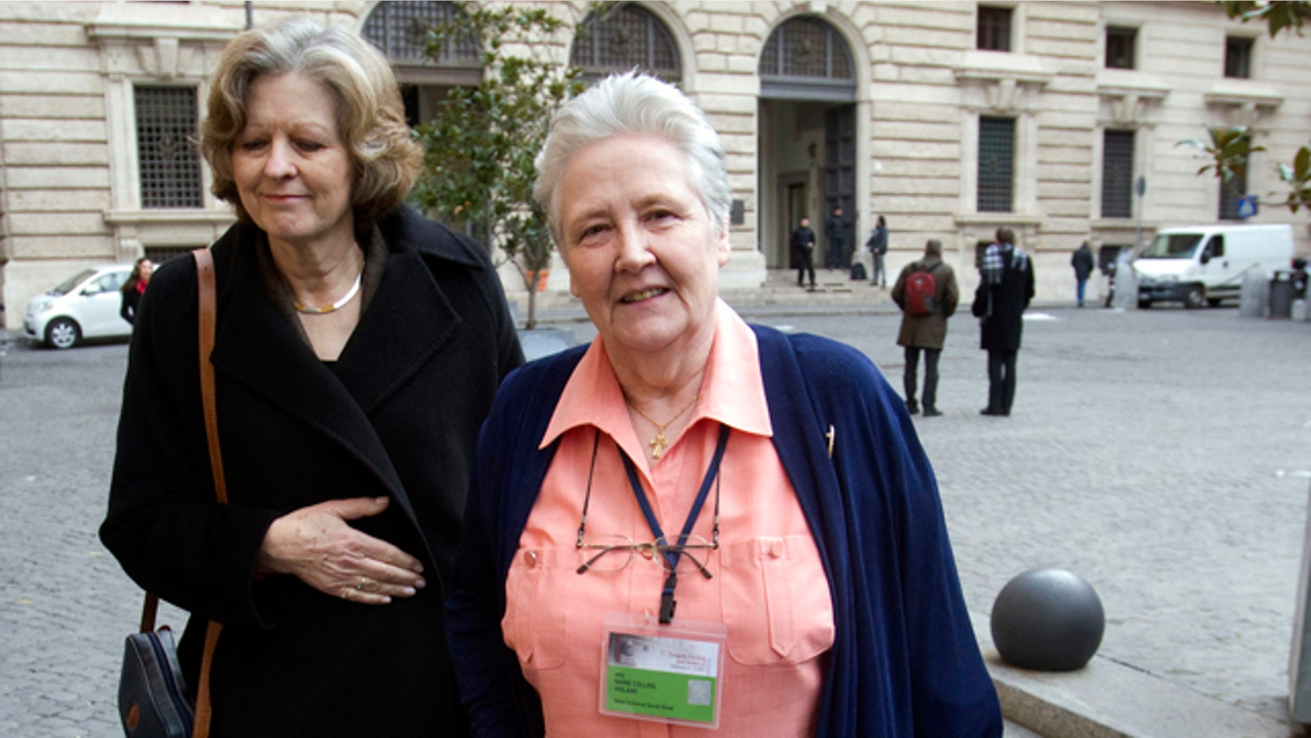 Feb. 7, 2012- Marie Collins, right who was allegedly assaulted as a 13-year-old by a hospital chaplain in her native Ireland, is flanked by British psychiatry professor Sheila Hollins, as they arrive at a Vatican-backed symposium on clerical sex abuse, in Rome.