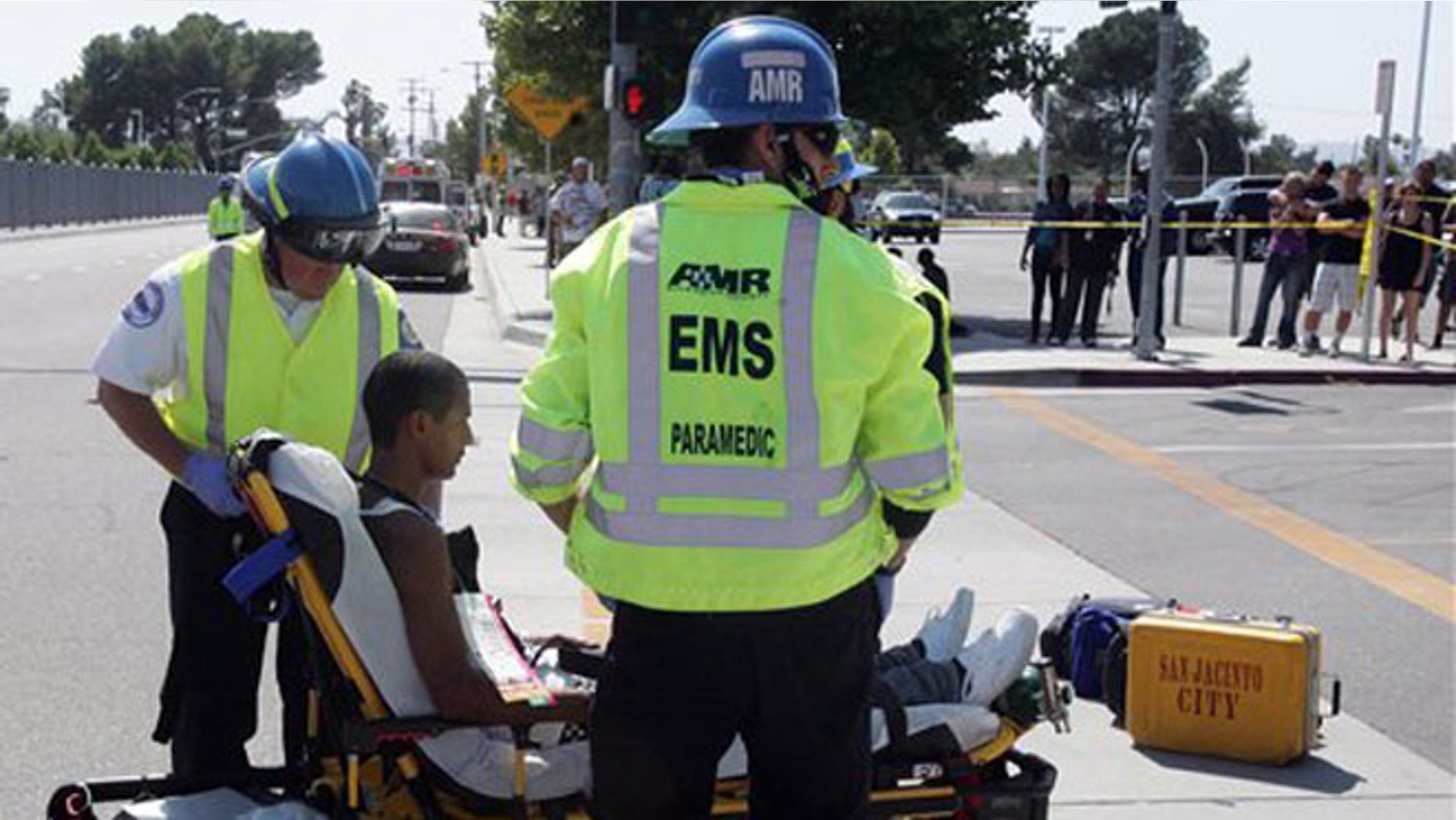 May 30, 2012: A Hemet High student is tended to by Cal Fire/Riverside County Paramedics after a truck struck eight people in a crosswalk in front of the school in Hemet, Calif.