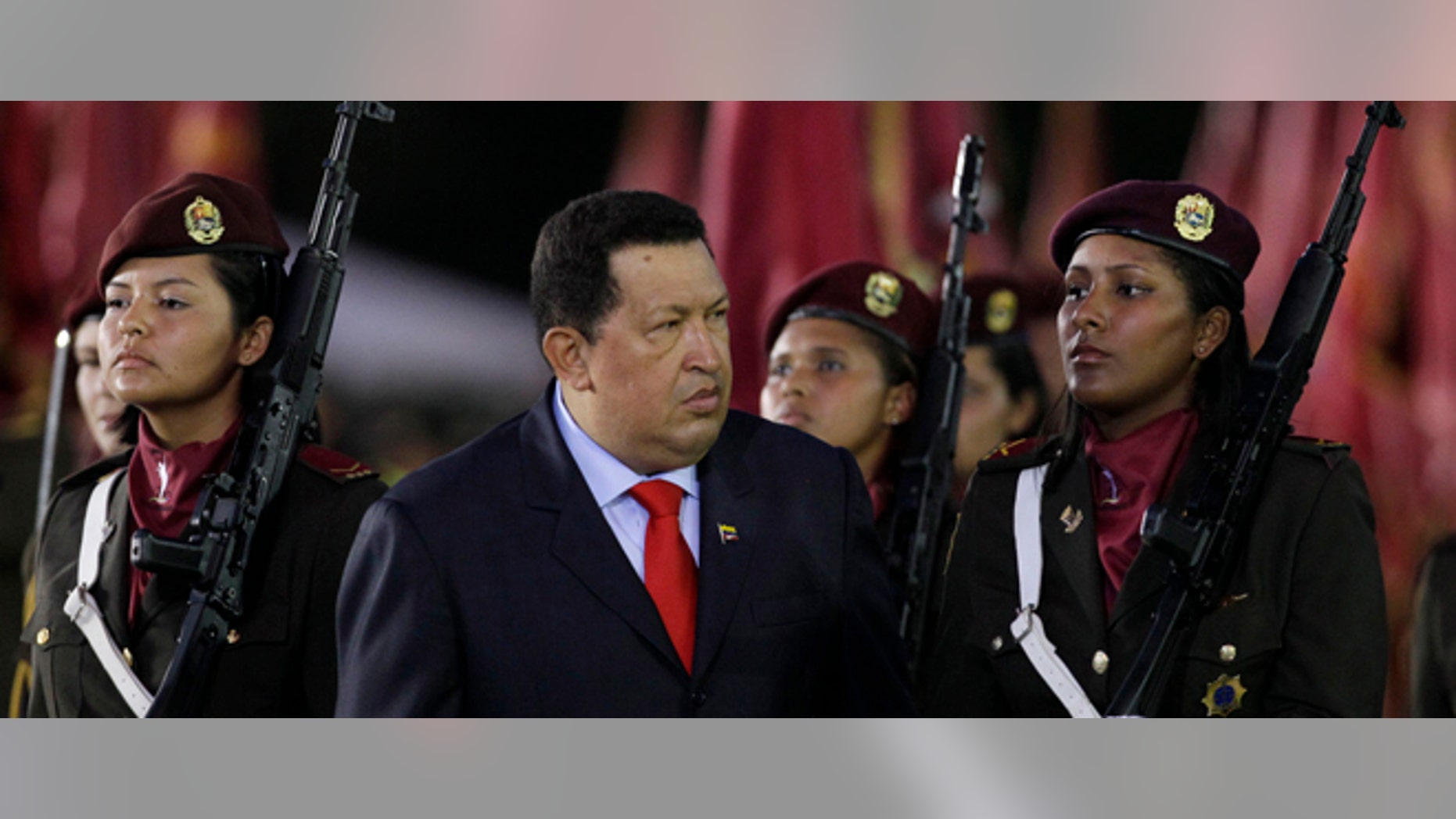 Venezuela's President Hugo Chavez attends a military ceremony marking the 75th anniversary of the creation of the Bolivarian National Guard at Fuerte Tiuna military base in Caracas, Venezuela, Friday, Aug. 10, 2012. (AP Photo/Ariana Cubillos)