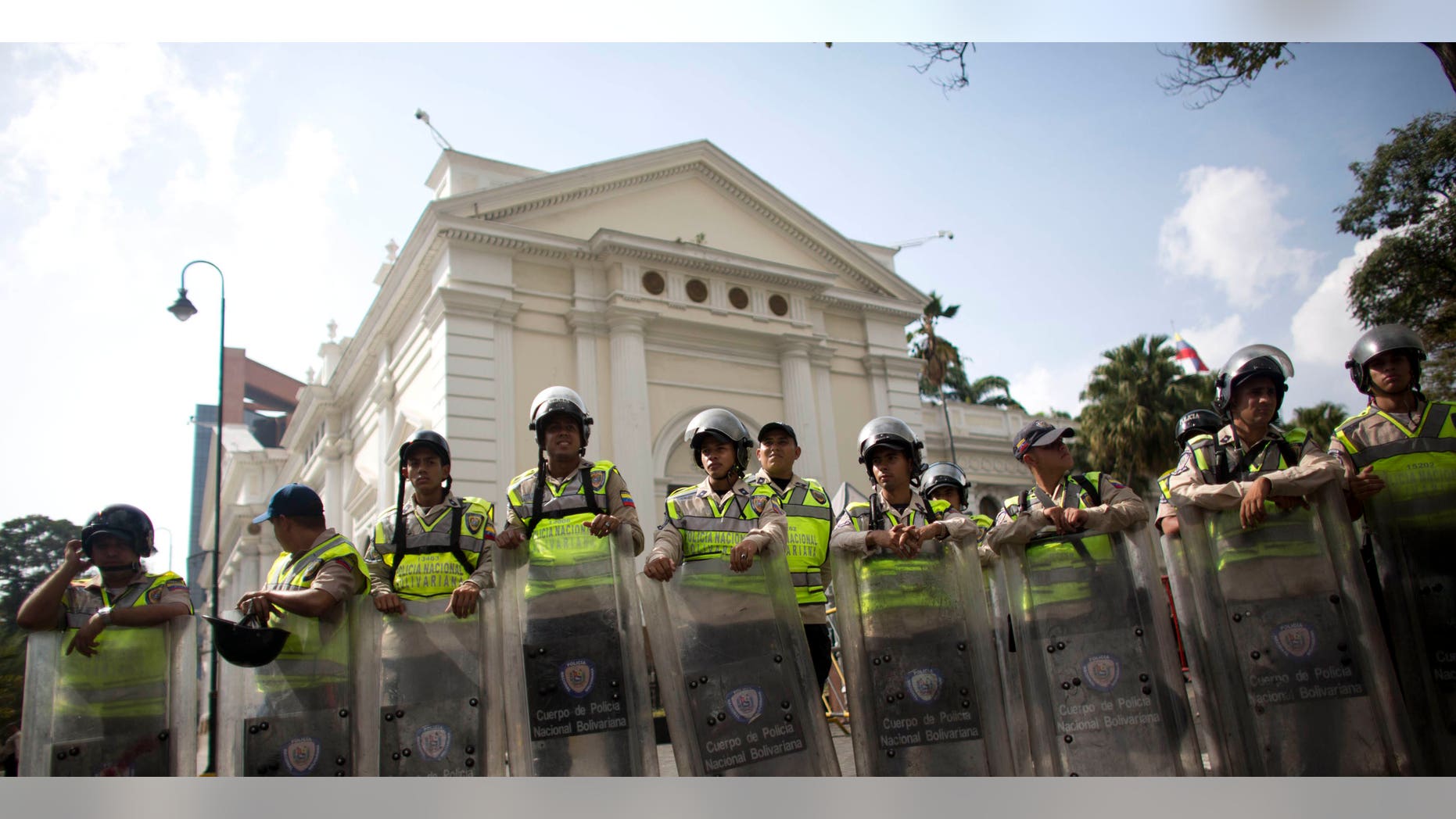 National Bolivarian Police officers outside the National Assembly building in Caracas, Venezuela, Tuesday, March. 1, 2016.