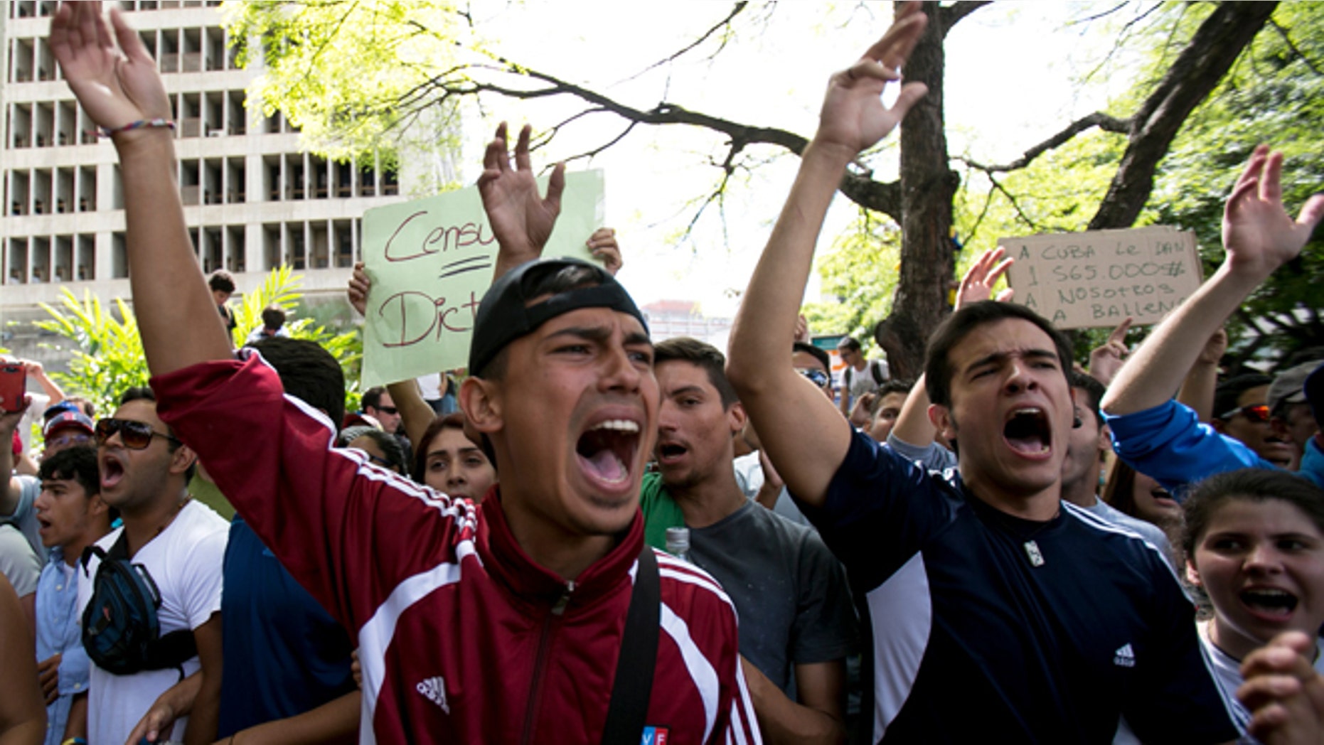Feb. 17, 2014: Students shout slogans against Venezuela's President Nicolas Maduro during a march to Venezuelan Telecommunications Regulator Office or CONATEL in Caracas, Venezuela.