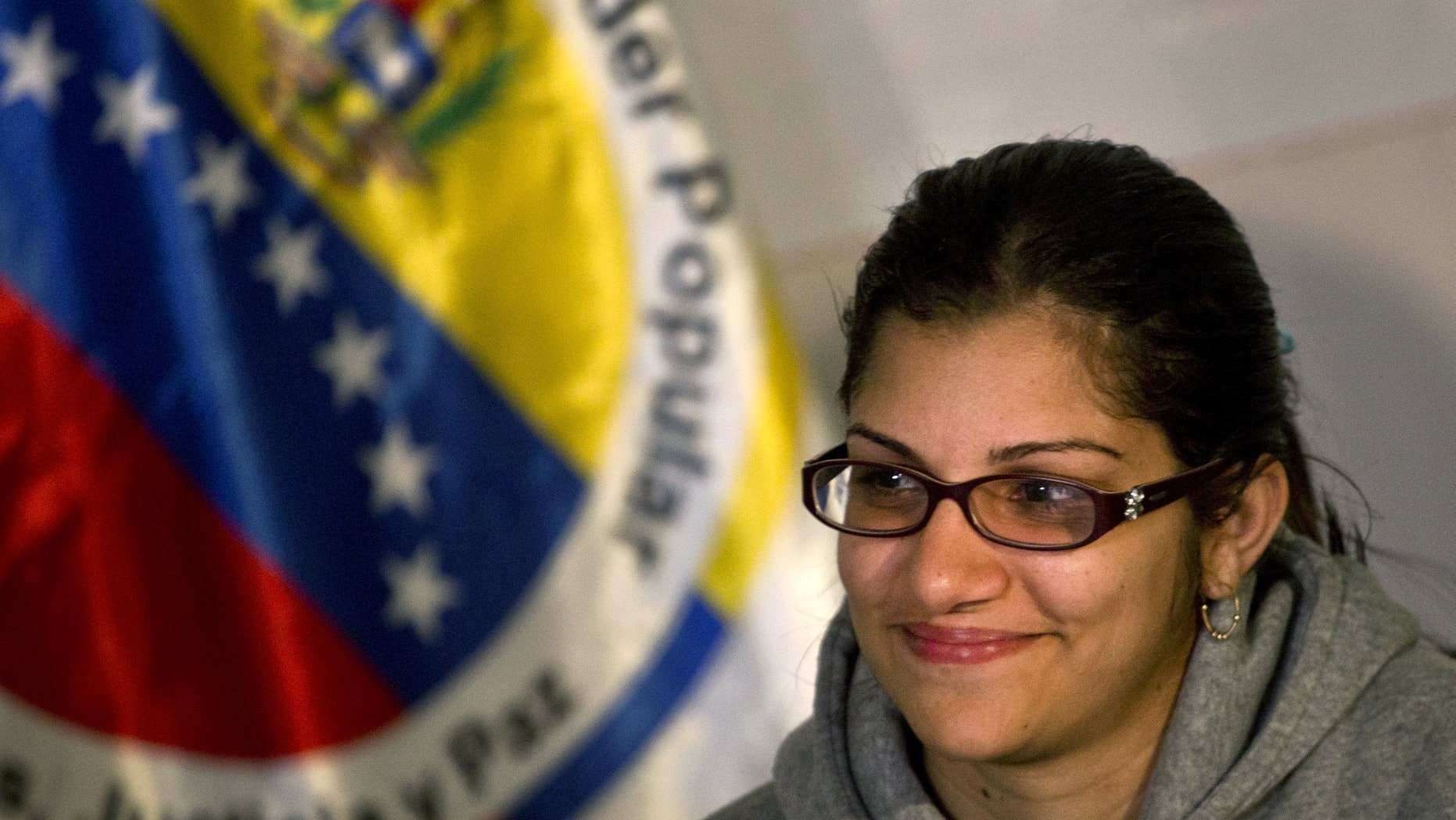 Nairobi Pinto gives a press conference following her release in Caracas, Venezuela, Monday, April 14, 2014.