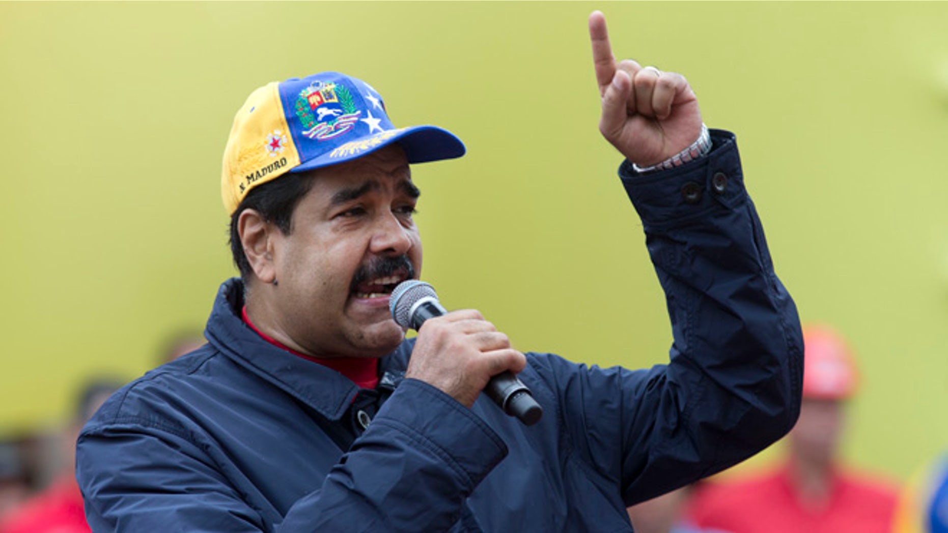 Venezuela's President Nicolas Maduro speaks during a May Day march in Caracas, Venezuela, Sunday, May 1, 2016.