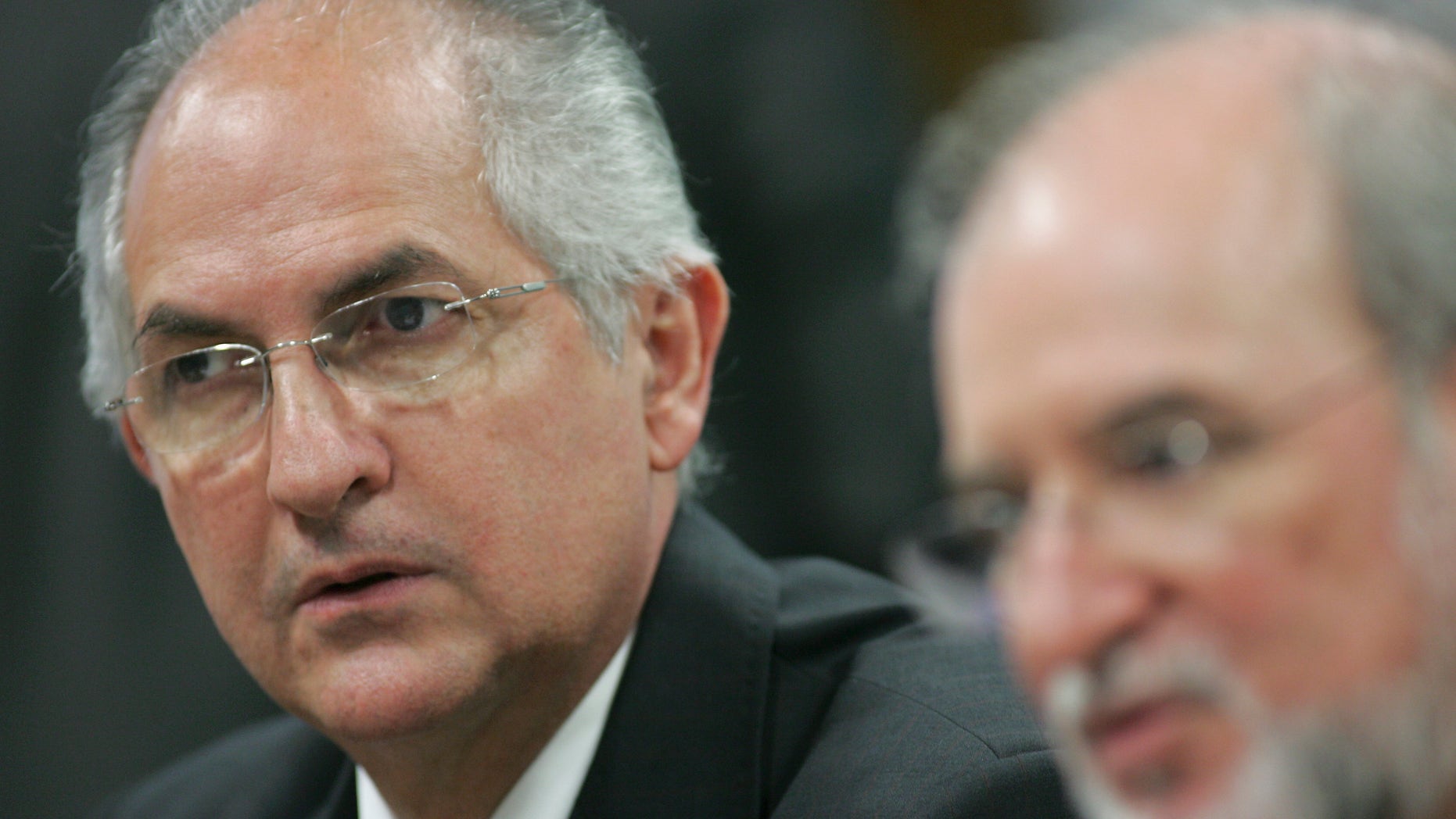 Caracas Mayor Antonio Ledezma, left, attends a meeting in senate chambers, in Brasilia, Brazil.(AP Photo)