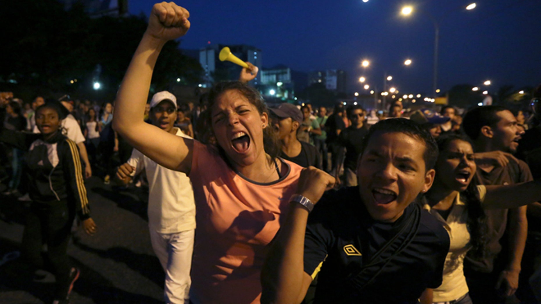 Students during a protest in Caracas, Venezuela, Thursday, Feb. 13, 2014.
