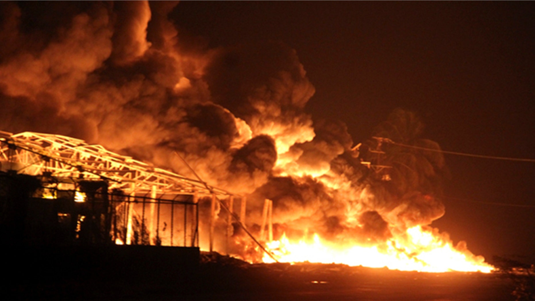 Fire rises over the Amuay oil refinery near Punto Fijo, Venezuela, Saturday, Aug. 25, 2012. A huge explosion rocked Venezuela's biggest oil refinery and unleashed a ferocious fire Saturday, killing over 20 people and injuring dozens in the deadliest disaster in memory for the country's key oil industry. (AP Photo/Diario EL Amanecer)