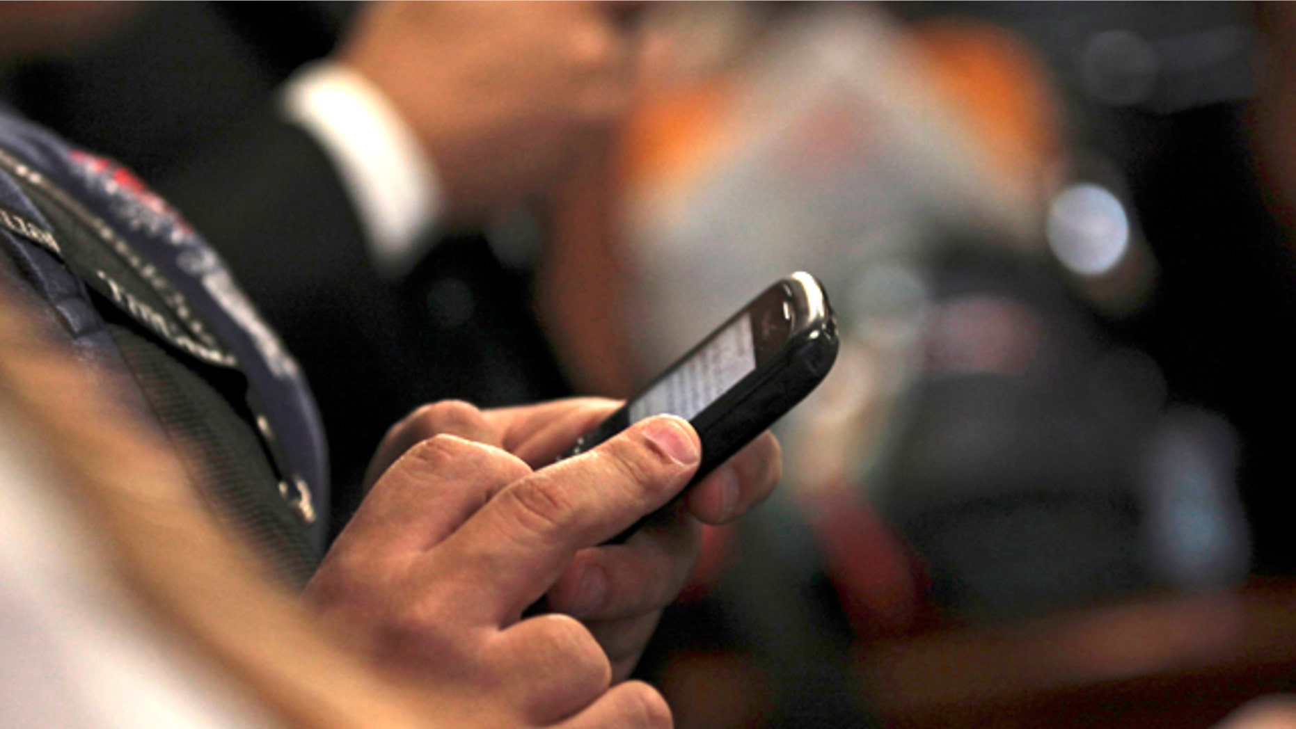 Sept. 14, 2011: A journalist tweets using his mobile phone during a news conference in Caracas, Venezuela. Bad idea. Venezuela's political battle is playing out in a new way on Twitter, where the accounts of at least nine critics of President Hugo Chavez have been mysteriously taken over by hackers who post pro-government messages along with insults and threats.