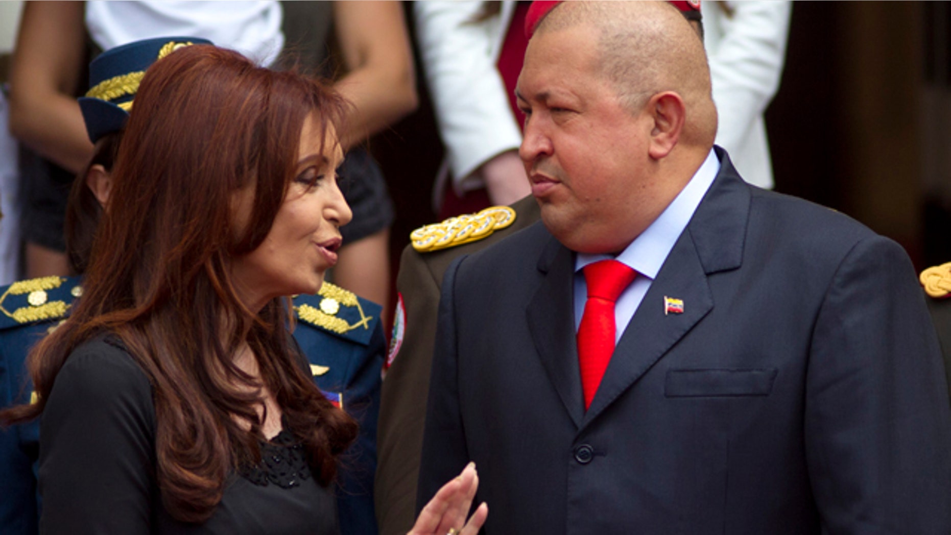 Dec. 1: Argentinas President Cristina Fernandez speaks with Venezuelas President Hugo Chavez during a ceremony upon Fernandezs arrival to Miraflores presidential palace in Caracas.