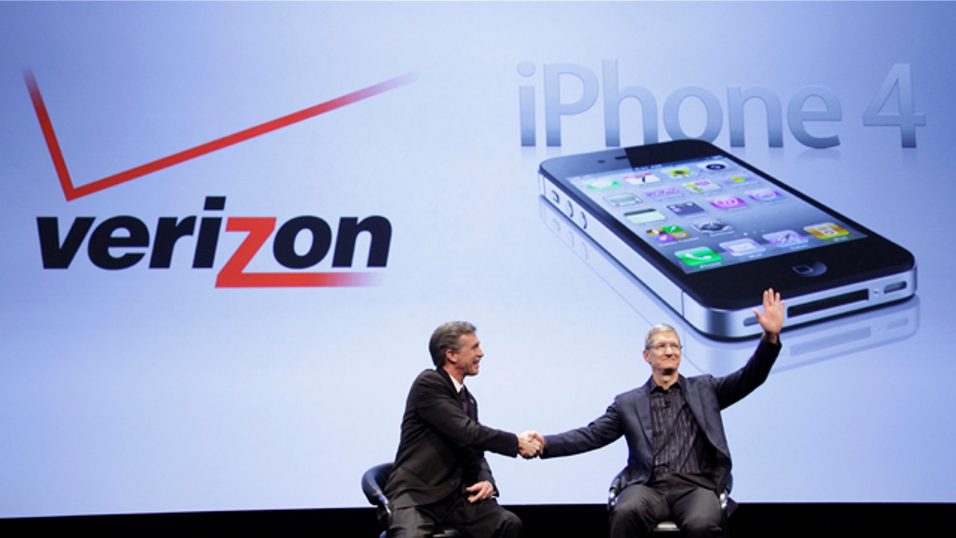 Dan Mead, left, CEO of Verizon Wireless, and Tim Cook, COO of Apple, announce that Verizon Wireless will carry Apple's iPhone, Tuesday, Jan. 11, 2011 in New York.