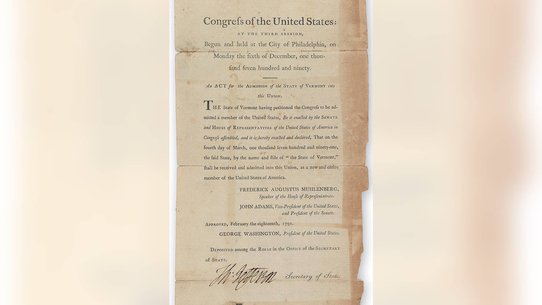 This 2014 photo released by Swann Auction Galleries of New York shows a portion of a document signed by Thomas Jefferson in 1791 declaring Vermont as the 14th of the United States. The document is set to be auctioned with others signed by Ethan Allen, a founder of the state, on Thursday, Nov. 20, 2014. (AP Photo/Swann Auction Galleries)