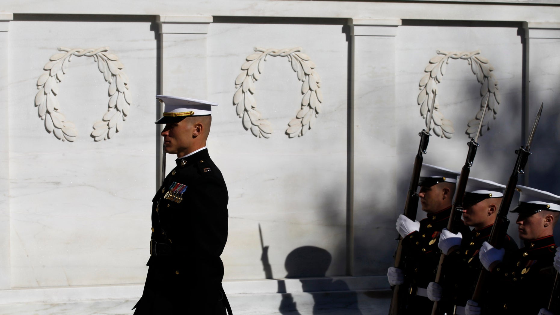 Nov. 11: The U.S. Marine Corps Honor Guard stands during the wreath ceremony at the Tomb of the Unknowns in honor of Veterans' Day at Arlington National Cemetery in Arlington, Va.