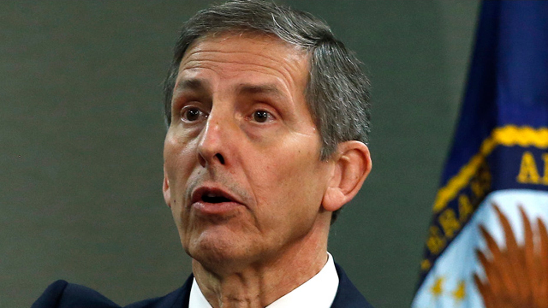 FILE - In this Aug. 6, 2014, file photo, Deputy Veterans Affairs Secretary Sloan Gibson speaks during a news conference during a visit to a Denver veterans hospital. (AP Photo/Brennan Linsley, File)