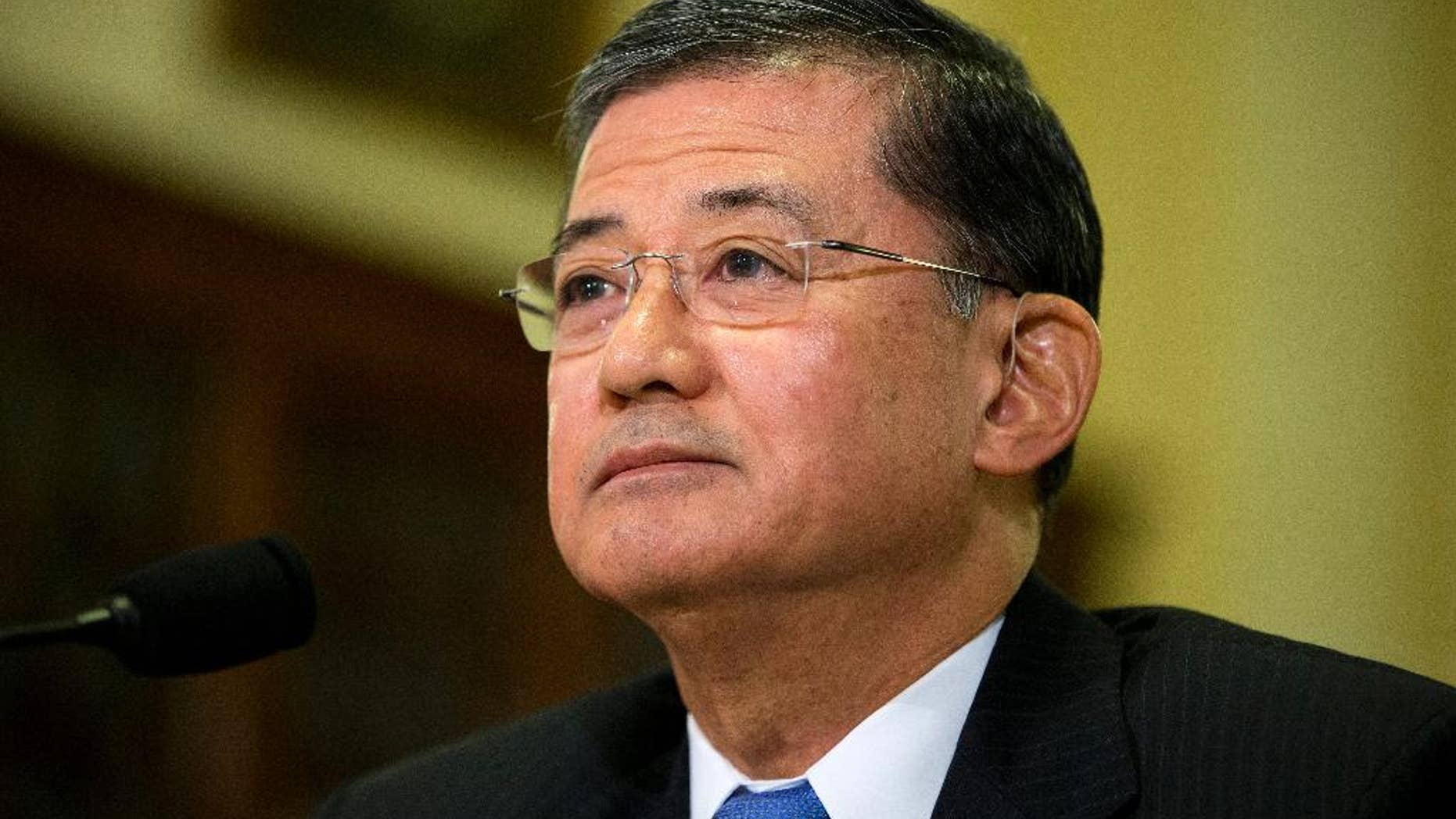 FILE - In this Oct. 9, 2013, file photo, Veterans Affairs Secretary Eric Shinseki listens as he testifies on Capitol Hill in Washington. Senate Republican leader Mitch McConnell of Kentucky says a leadership change may help resolve what he calls "dysfunction" at the Department of Veterans Affairs, following allegations of corruption and avoidable deaths at the veterans' hospital in Phoenix. McConnell says the tenure of Veterans Affairs Secretary Eric Shinseki is "embarrassing" and that the agency is in "a stunning period of dysfunction." McConnell isn't calling for Shinseki to step down, but says a change in leadership "might be a good thing."(AP Photo/ Evan Vucci, File)