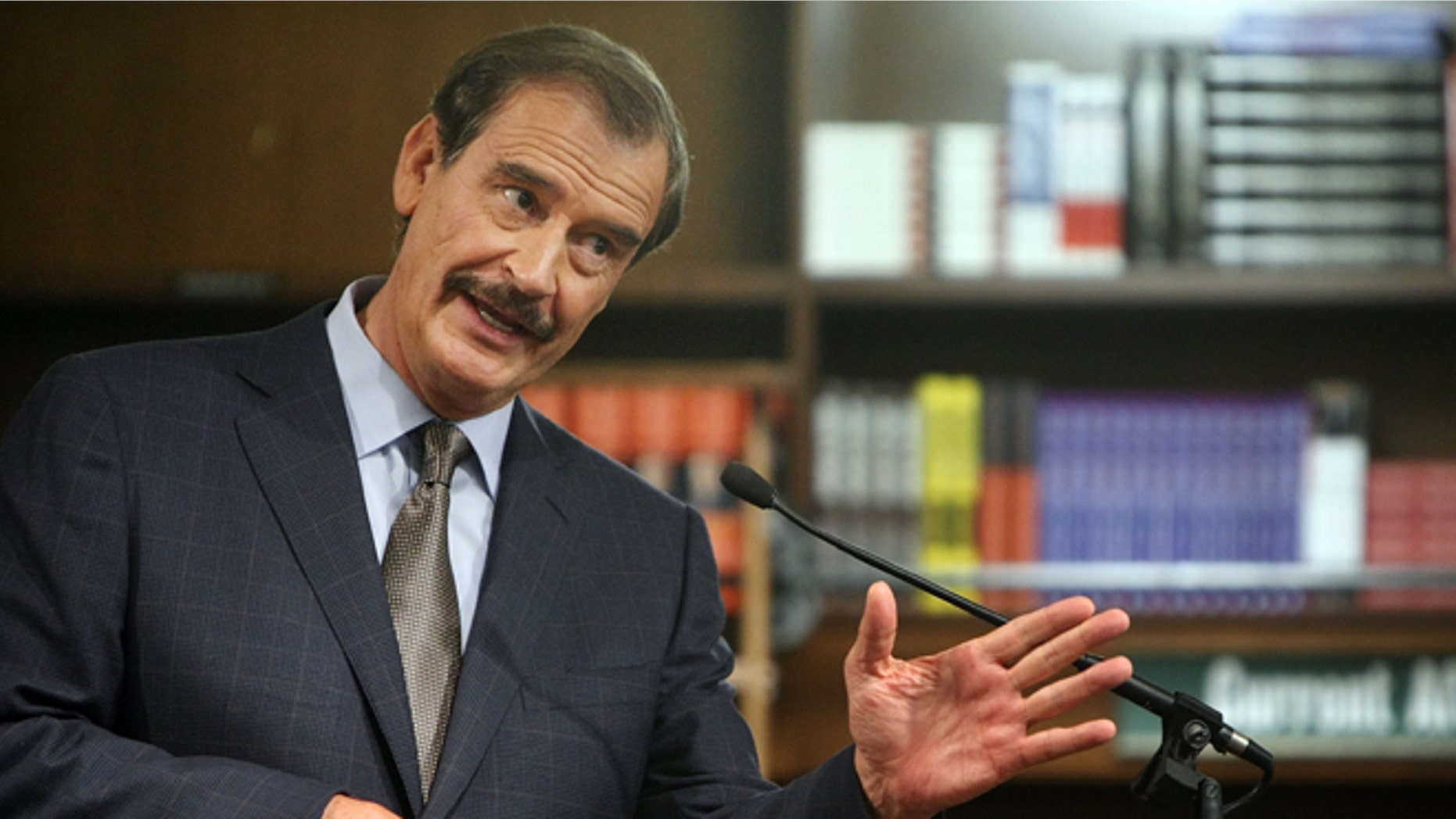 NEW YORK - OCTOBER 9: Former Mexican President Vicente Fox speaks before signing copies of his memoir "Revolution of Hope" in the Barnes & Noble Union Square store October 9, 2007 in New York City. Fox openly writes in the book about major world personalities including U.S. President George W. Bush. (Photo by Mario Tama/Getty Images) *** Local Caption *** Vicente Fox