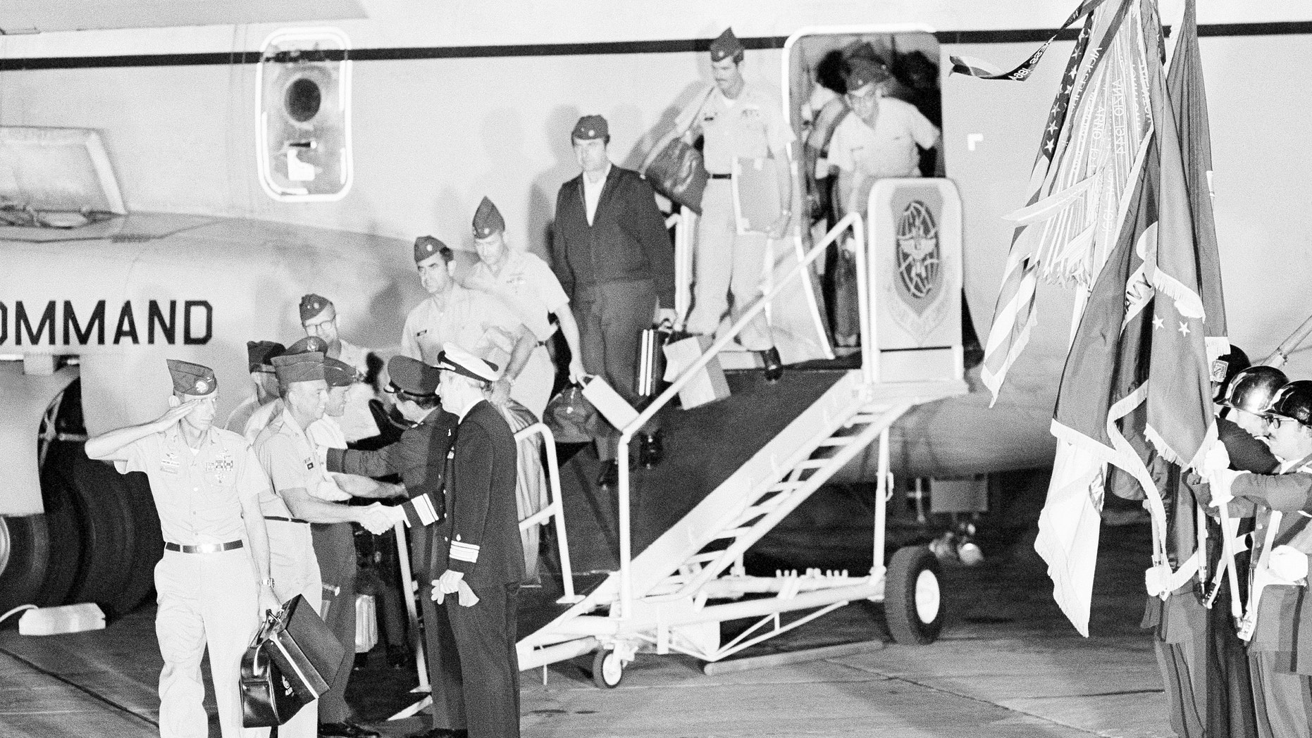 March 30, 1973 - FILE photo: As the last 55 troops to leave Vietnam debarked their Air Force C-141 at Travis Air Force Base, angry protesters still awaited them at home.