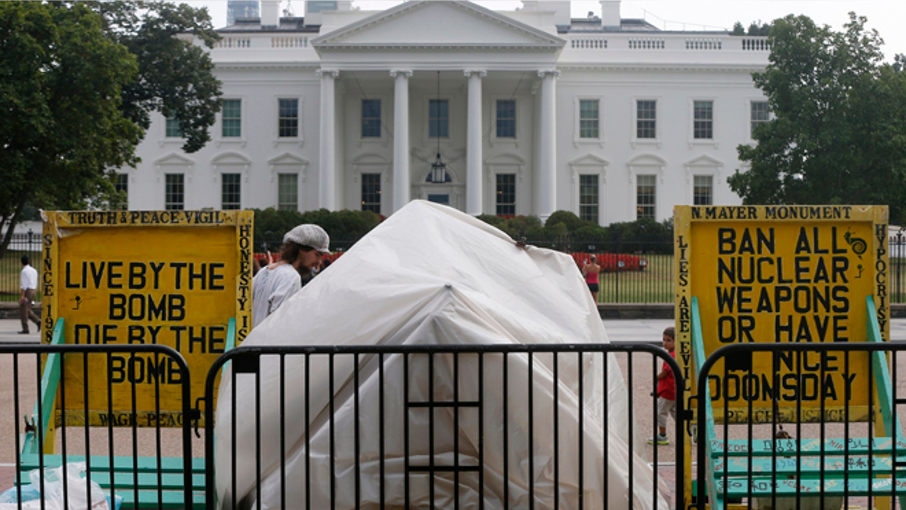 Sept. 12, 2013: The protest shelter for peace protestor Concepcion Picciotto, who holds a constant peace vigil in Lafayette Park across from the White House in Washington, is reassembled after her belongings were returned by Park Police after they were seized by Park Police.