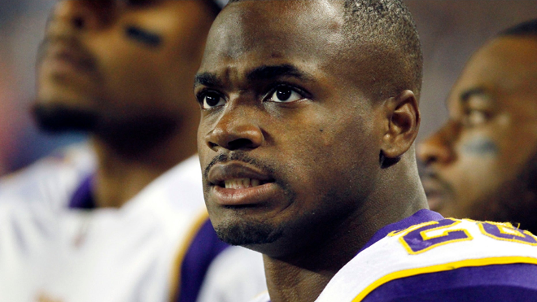 Oct. 16, 2011: In this file photo, Minnesota Vikings running back Adrian Peterson watches from the sidelines during the first half of an NFL football game in Chicago. (AP)