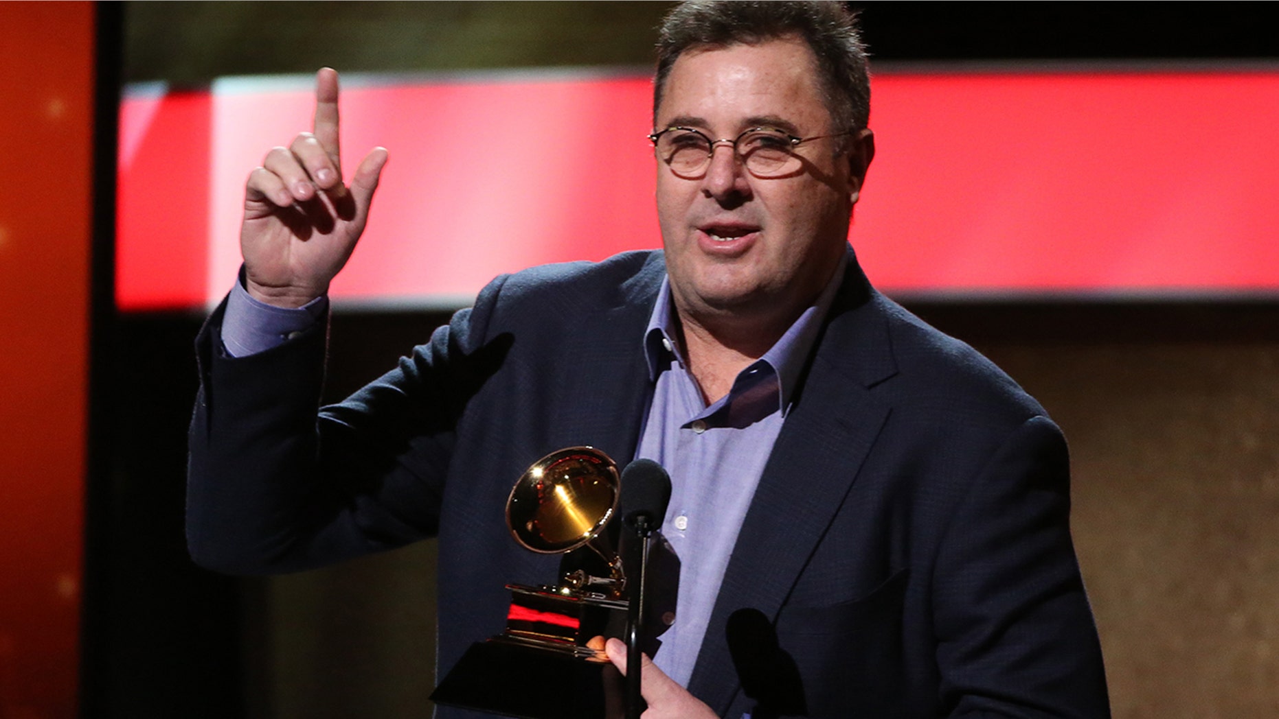 Vince Gill accepts the Grammy for American Roots Song for "Kid Sister" at the 59th Annual Grammy Awards in Los Angeles, California, U.S. , February 12, 2017.