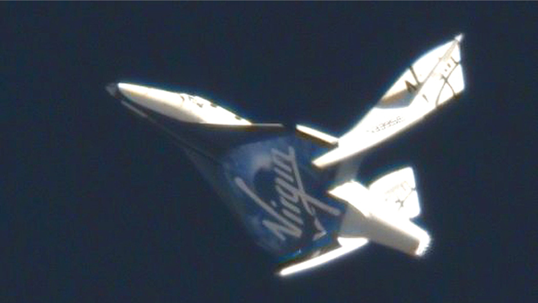 Virgin's VSS Enterprise falls back to Earth, completing a test known as "feathering."