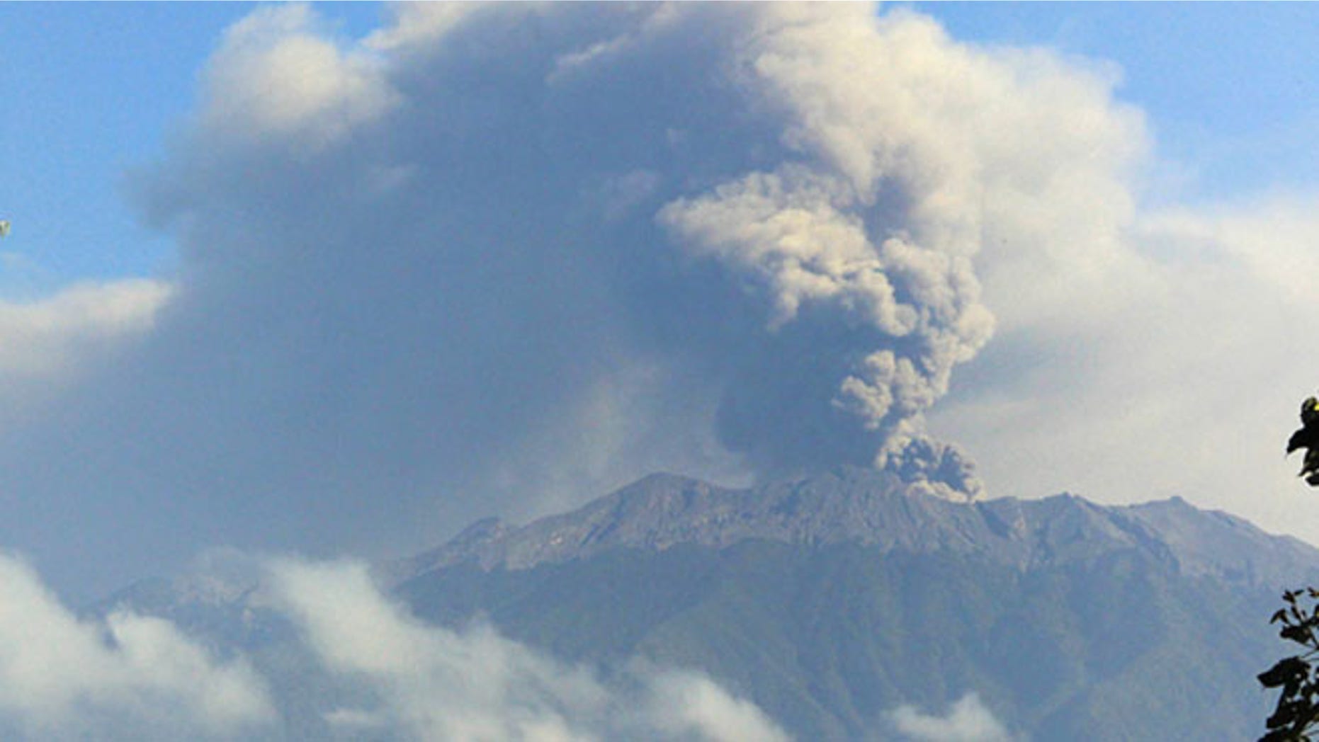 Mount Raung spews volcanic material into the air.