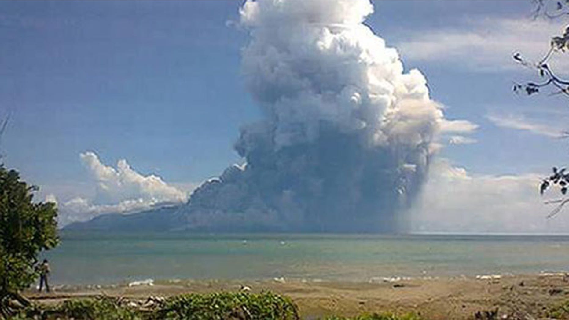 Aug. 10, 2013: The Mount Rokatenda volcano spews a huge column of hot ash during an eruption.
