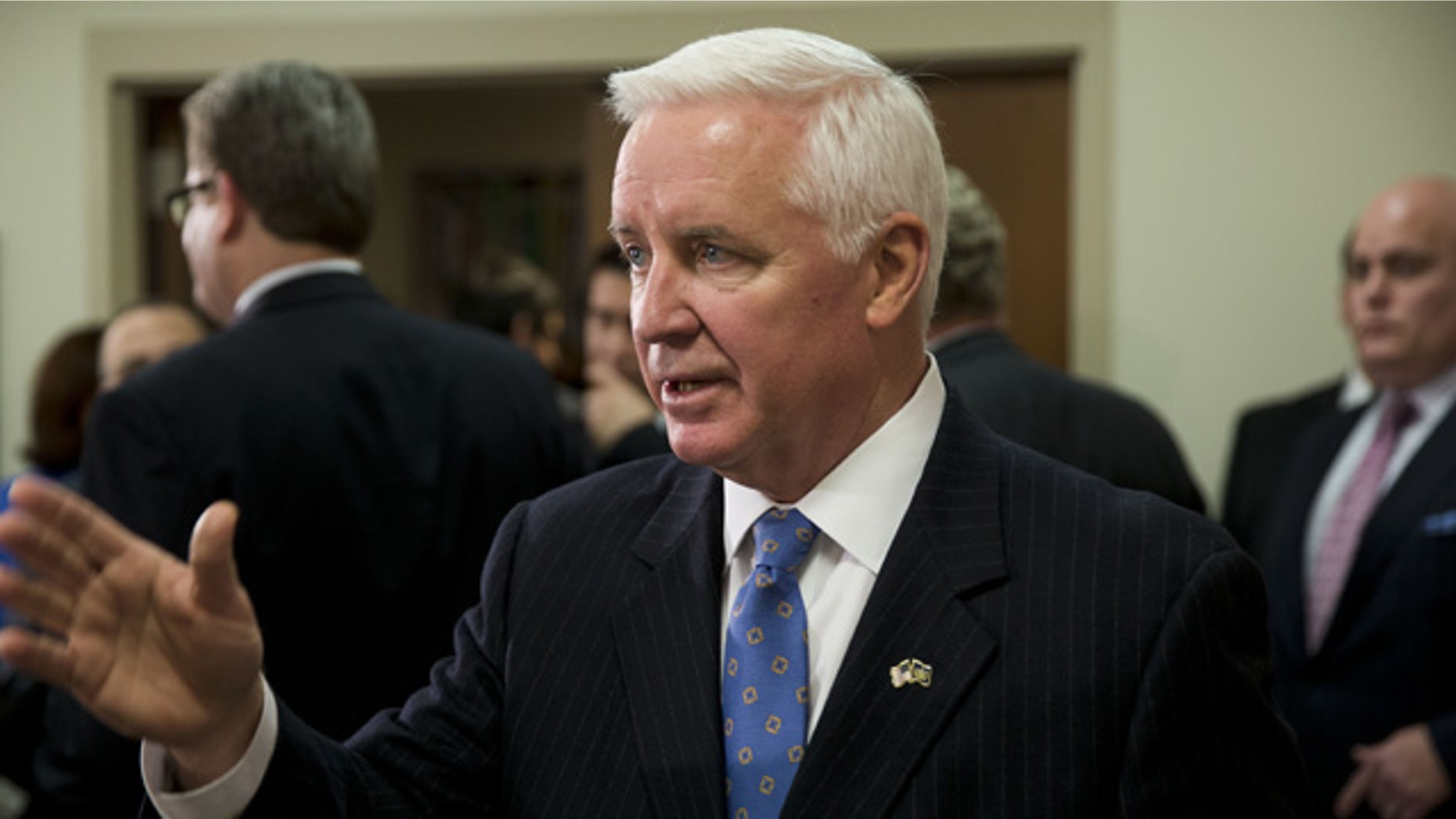Jan. 17, 2014: Gov. Tom Corbett gestures as he responds to a question during a news conference.
