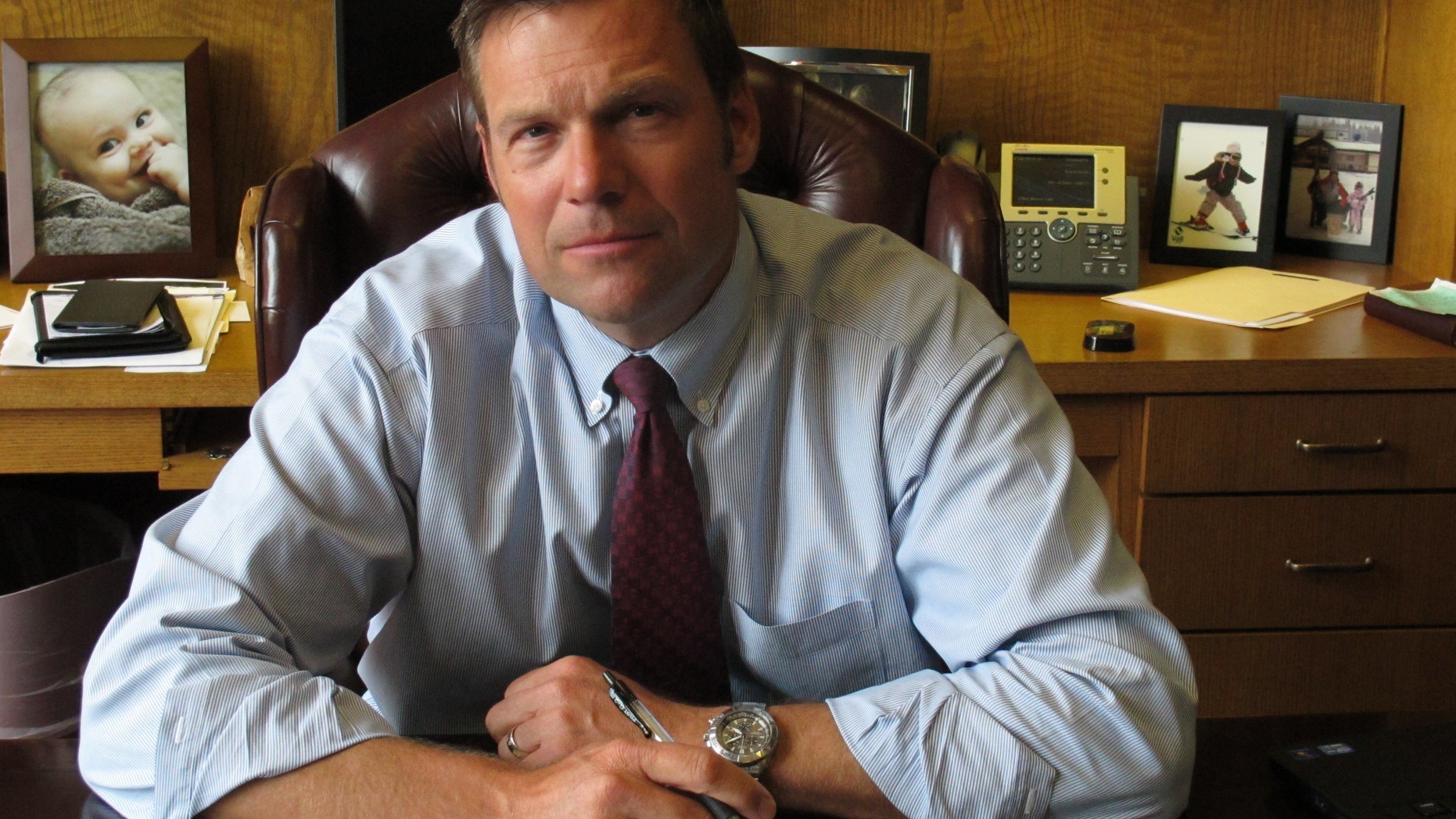 Kansas Secretary of State Kris Kobach, the architect of the state's proof-of-citizenship law for new voters, in Aug. 1, 2013.