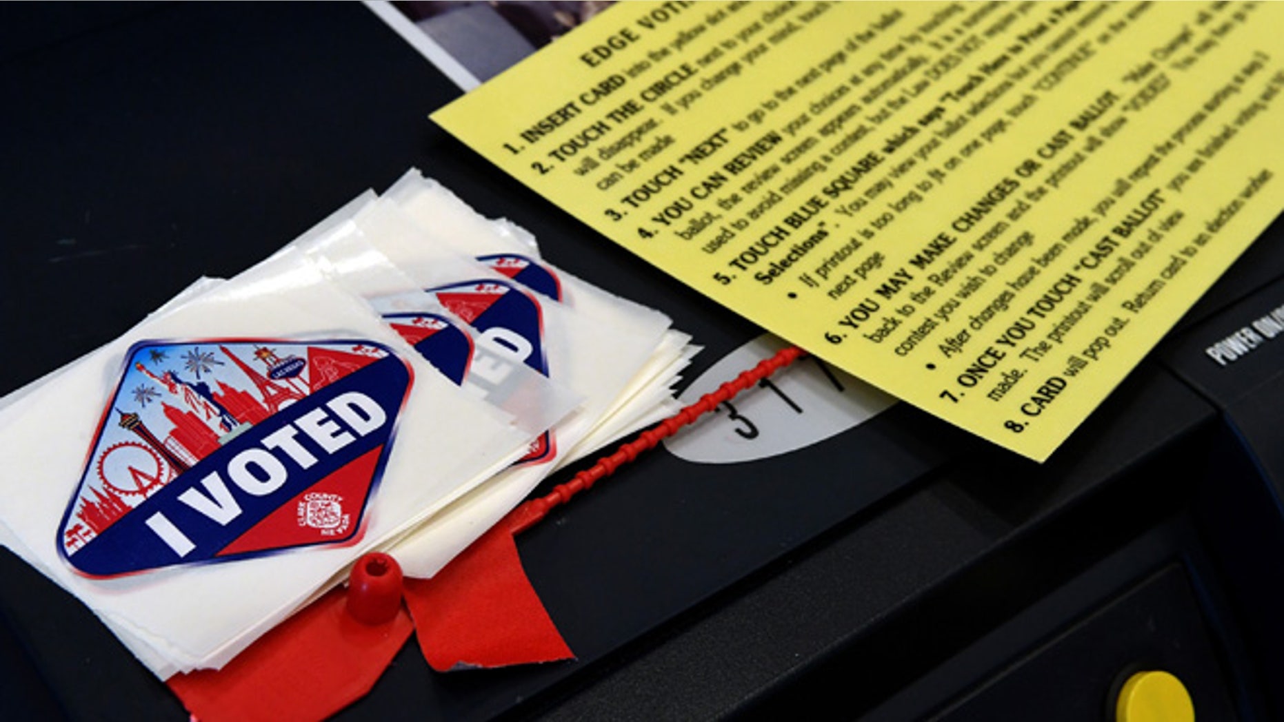 LAS VEGAS, NV - NOVEMBER 08: Las Vegas Strip-themed "I Voted" stickers are stacked next to a voting instruction card on the back of a voting machine at a polling station at John W. Bonner Elementary School on Election Day on November 8, 2016 in Las Vegas, Nevada. Americans across the nation are picking their choice for the next president of the United States. (Photo by Ethan Miller/Getty Images)