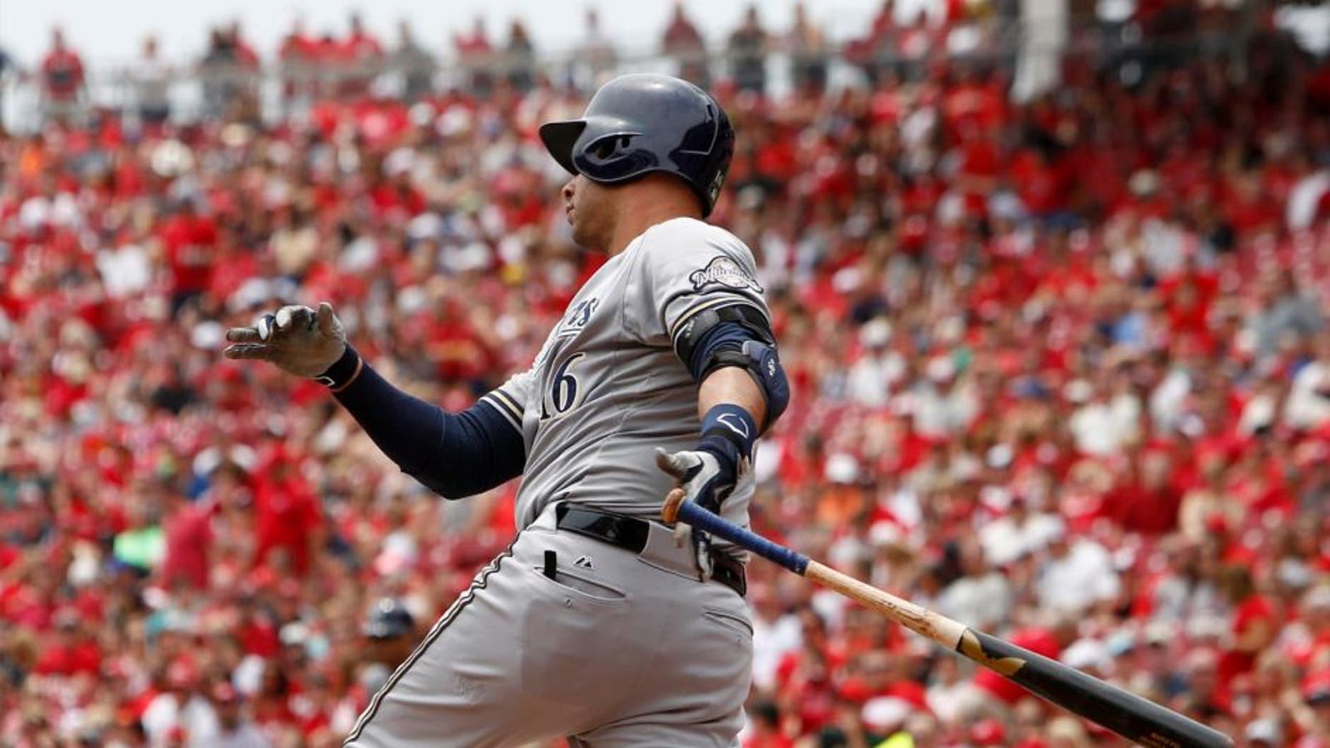 Sunday, July 5: Milwaukee Brewers third baseman Aramis Ramirez hits a RBI single off Cincinnati Reds starting pitcher Mike Leake in the first inning at Great American Ball Park.