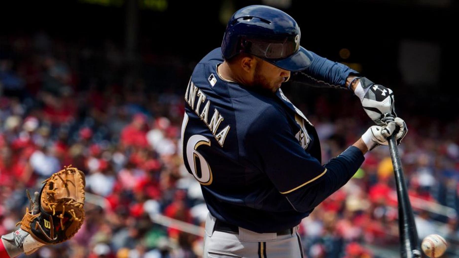 Sunday, Aug. 23: The Milwaukee Brewers' Domingo Santana hits the ball in the second inning against the Washington Nationals.