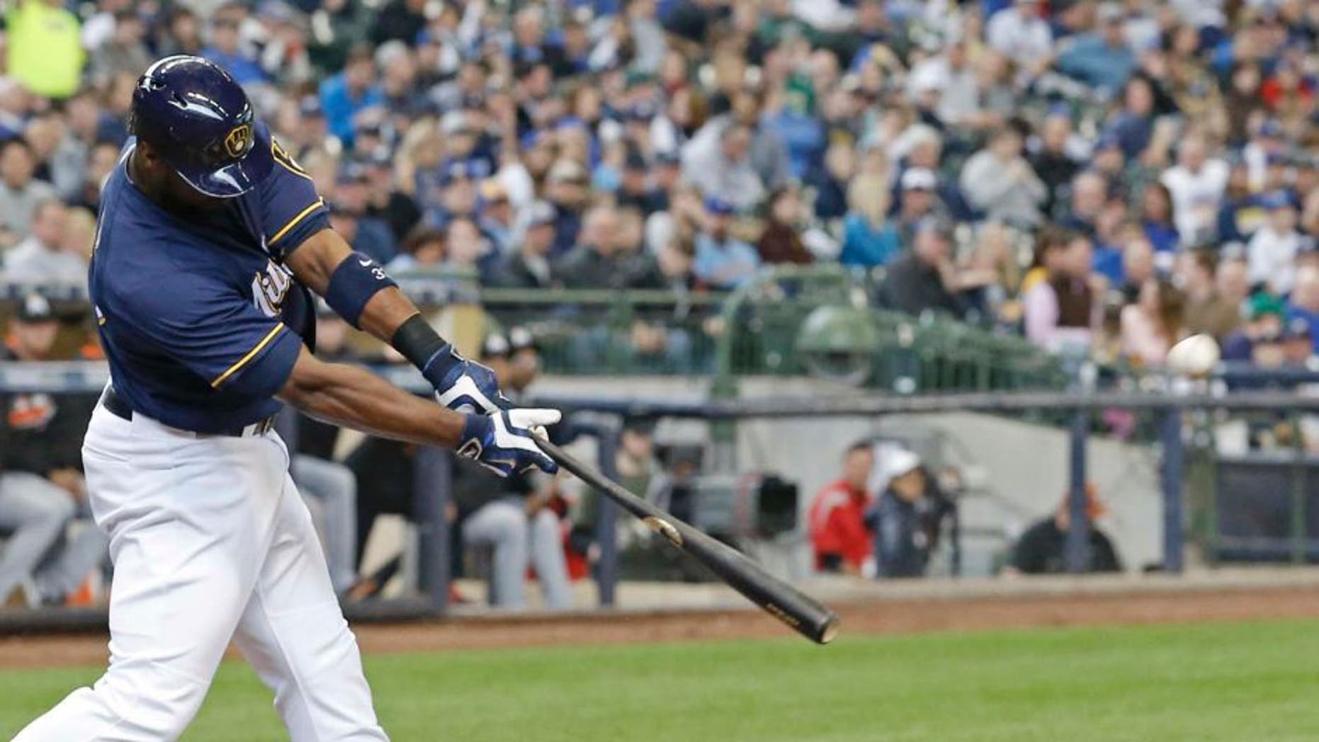 Sunday, May 1: The Milwaukee Brewers' Chris Carter hits a two-run home run during the third inning against the Miami Marlins in Milwaukee. Carter had two homers in the 14-5 win.