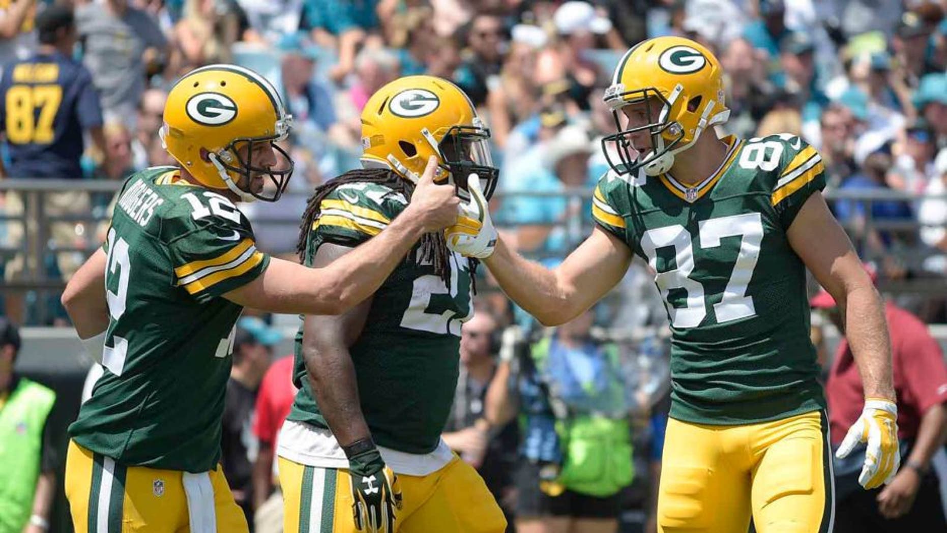 Sunday, Sept. 11: Green Bay Packers quarterback Aaron Rodgers (left) celebrates his touchdown run against the Jacksonville Jaguars with wide receiver Jordy Nelson during the first half in Jacksonville, Fla. The Packers won 27-23.