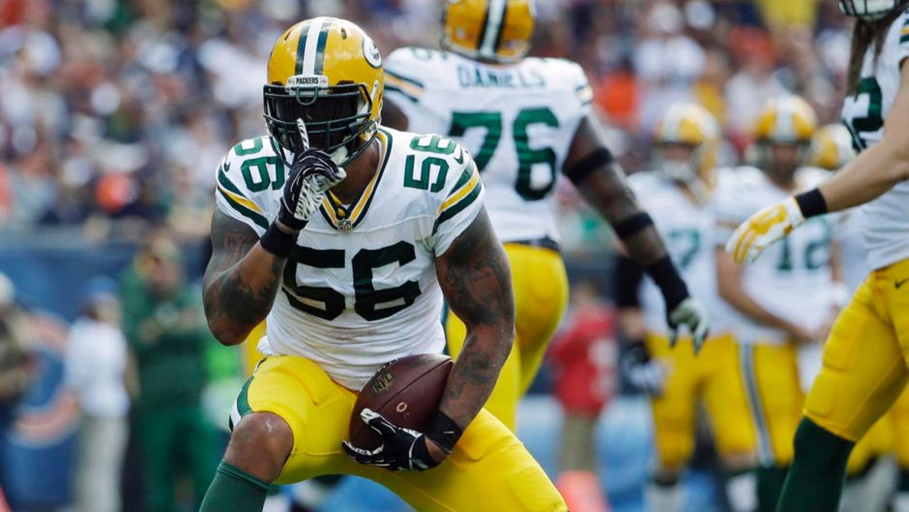 Sunday, Sept. 13: Green Bay Packers outside linebacker Julius Peppers reacts after sacking Chicago Bears quarterback Jay Cutler during the first half in Chicago.
