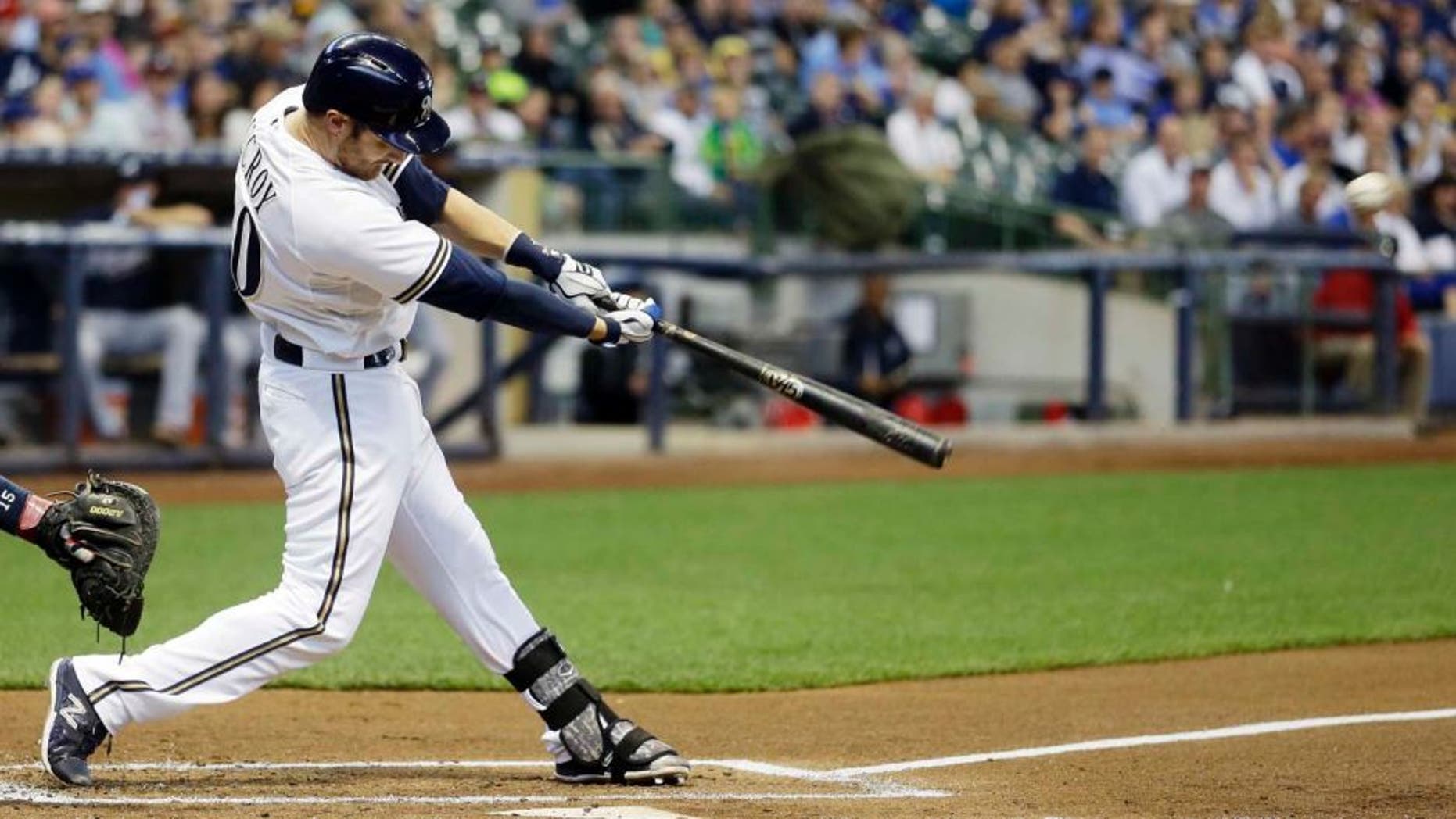 Tuesday, July 7: The Milwaukee Brewers' Jonathan Lucroy hits a home run during the first inning against the Atlanta Braves in Milwaukee.