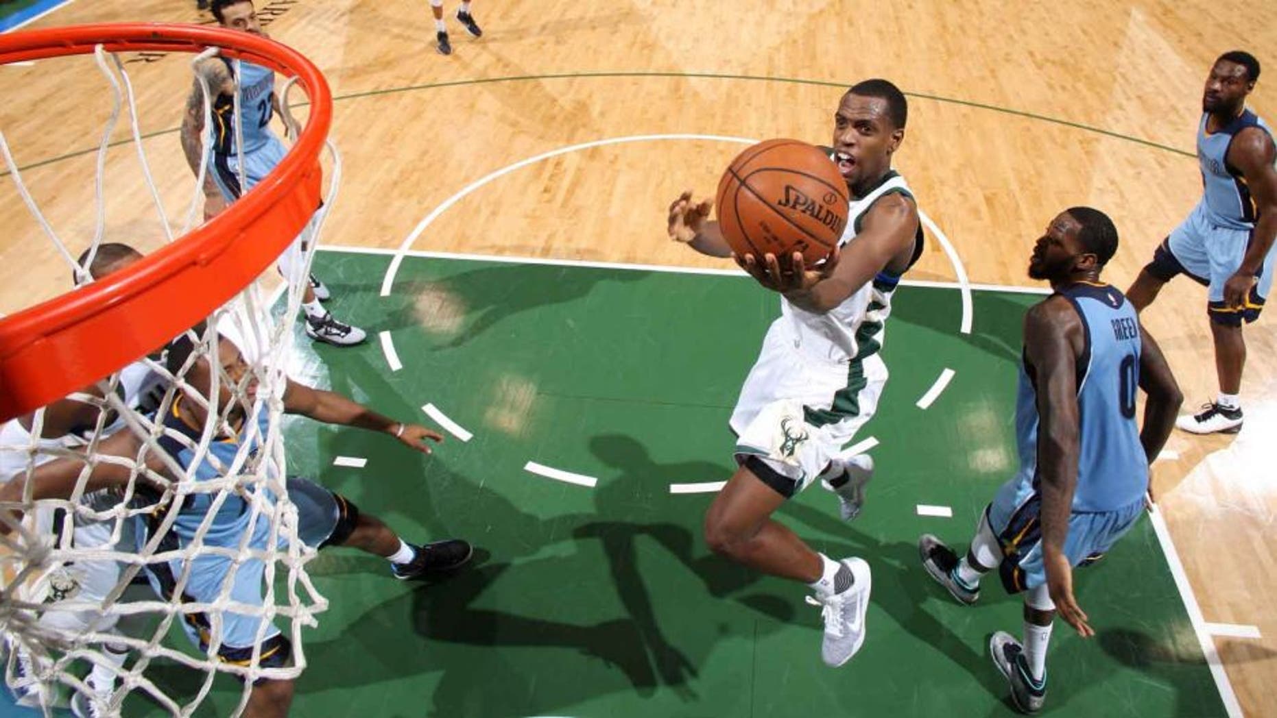Thursday, March 17: The Milwaukee Bucks' Khris Middleton goes for the layup during the game against the Memphis Grizzlies at the BMO Harris Bradley Center in Milwaukee, Wis.