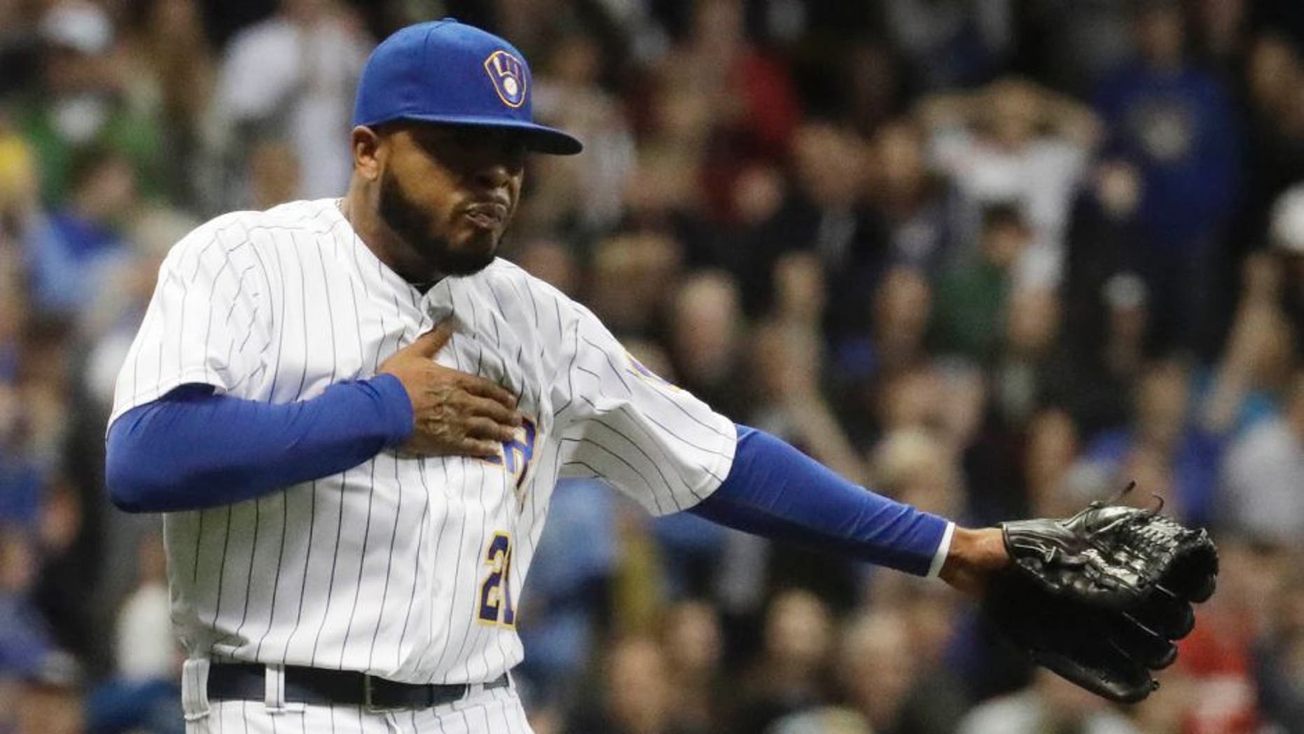 Friday, May 13, 2016: Milwaukee Brewers relief pitcher Jeremy Jeffress celebrates after getting San Diego Padres' Brett Wallace out to end the ninth inning in Milwaukee. The Brewers won 1-0.
