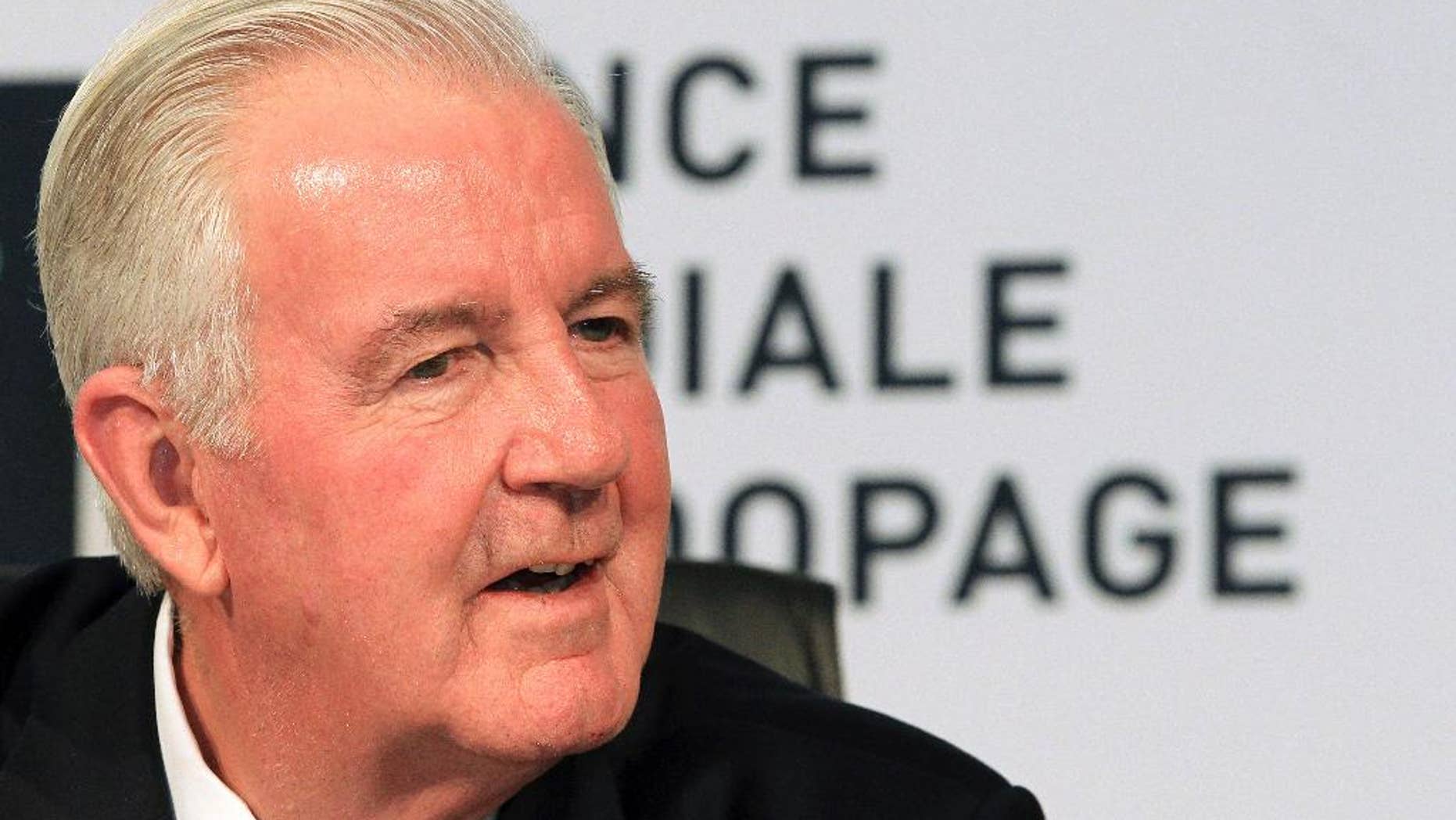 FILE - In this Friday, Nov. 15, 2013 file photo, the newly appointed World Anti-Doping Agency (WADA) president Craig Reedie takes a question during a media conference in Johannesburg, South Africa. Reedie is traveling to Jamaica to check whether the Caribbean island has put its house in order and set up an effective drug-testing program in the tiny nation that produces the world’s dominant sprinters, it was reported on Friday, Feb. 20, 2015. He will become the first WADA president to visit Jamaica, which came under scrutiny following revelations of a complete lack of out-of-competition testing among its athletes in the months before the 2012 London Olympics. (AP Photo/Themba Hadebe, FIle)