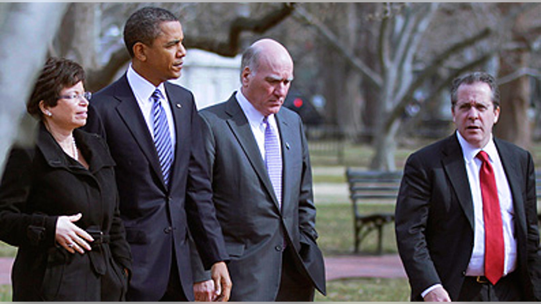 Monday: President Obama is surrounded by Senior adviser Valerie Jarrett, Chief of Staff Bill Daley and National Economic Council Director Gene Sperling while walking back to the White House from the U.S. Chamber of Commerce.
