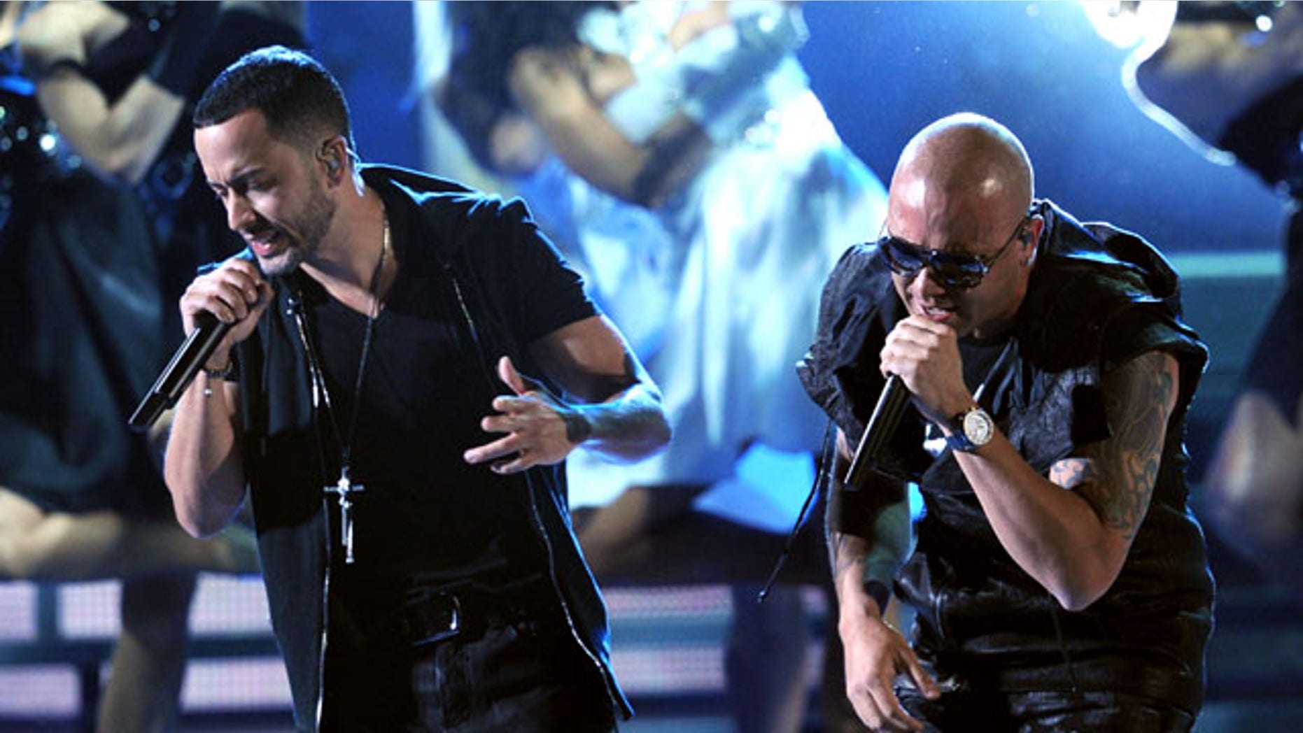 LAS VEGAS, NV - NOVEMBER 10: Wisin Y Yandel perform onstage during the 12th annual Latin GRAMMY Awards at the Mandalay Bay Events Center on November 10, 2011 in Las Vegas, Nevada. (Photo by Kevin Winter/Getty Images for Latin Recording Academy)