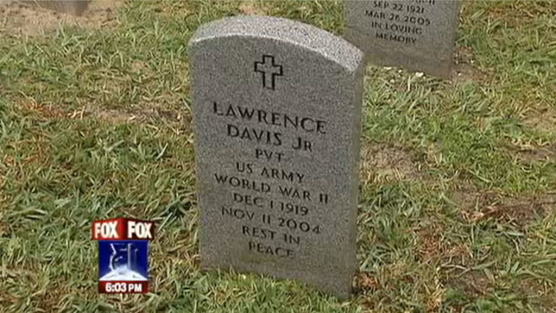 Photo shows the gravestone of Lawrence Davis Jr., a World War II veteran who was found to have been buried in a cardboard box in Florida.