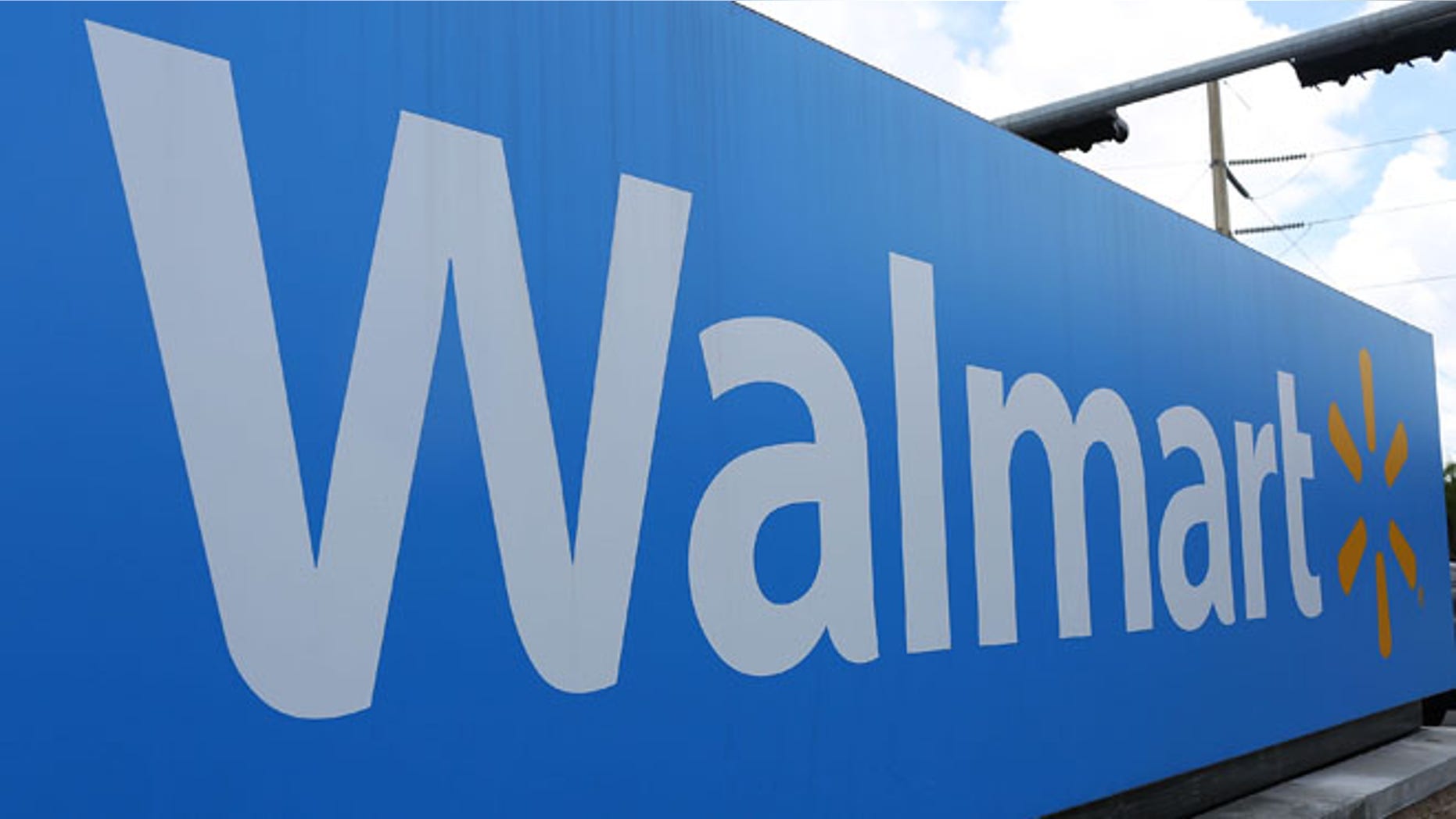 MIAMI, FL - AUGUST 18: A Walmart sign is seen on August 18, 2015 in Miami, Florida. Walmart announced today that earnings fell in the second quarter due to currency fluctuations and the retailer's investment in employee wages and training. (Photo by Joe Raedle/Getty Images)