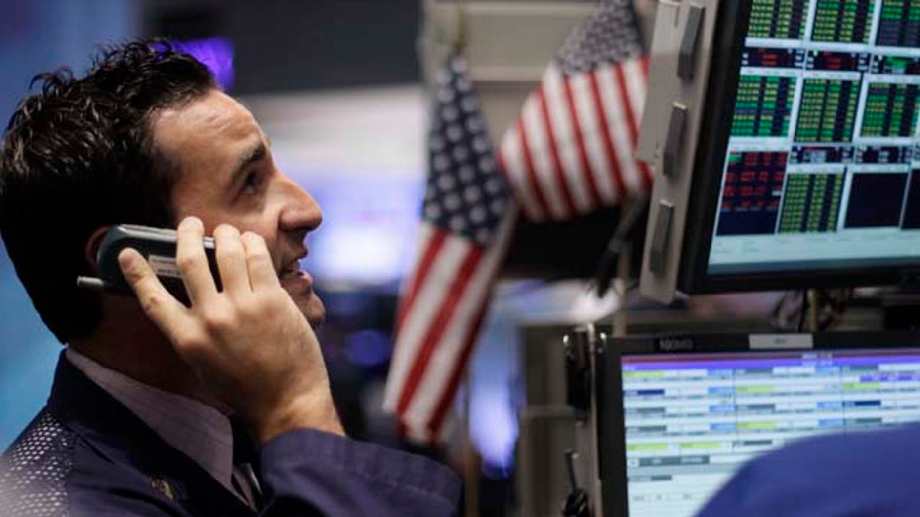 A specialist works at the New York Stock Exchange, Friday, Sept. 23, 2011 in New York. Investors fear that a global recession may already be under way. (AP Photo/Mark Lennihan)
