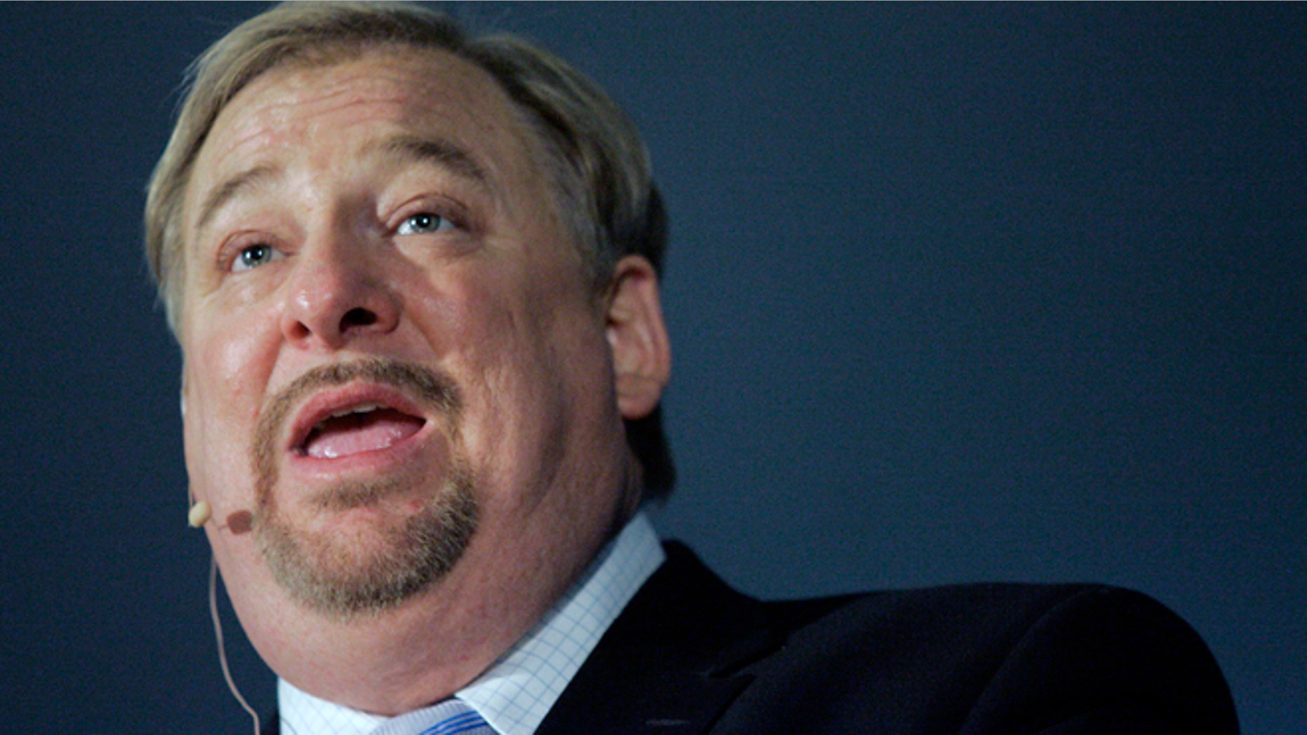 In this June 23, 2009 photo, Evangelical pastor Rick Warren speaks to about 800 people under a large tent at St. Vincent's Episcopal Cathedral Church in Bedford, Texas.